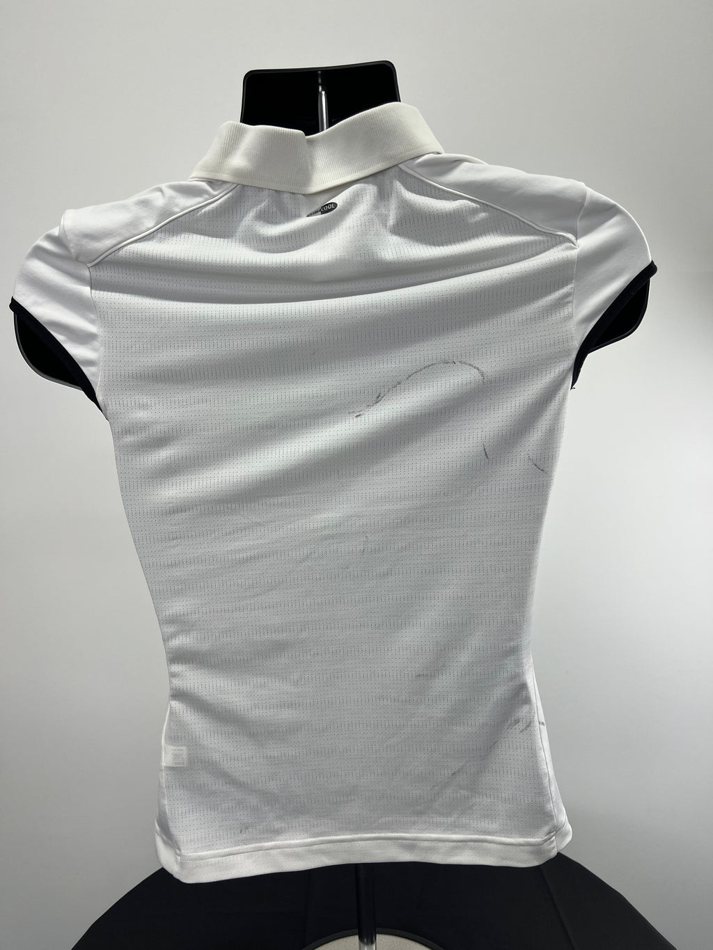 Back view of adidas women’s white tennis polo top showing breathable Clima365 fabric and ribbed collar
