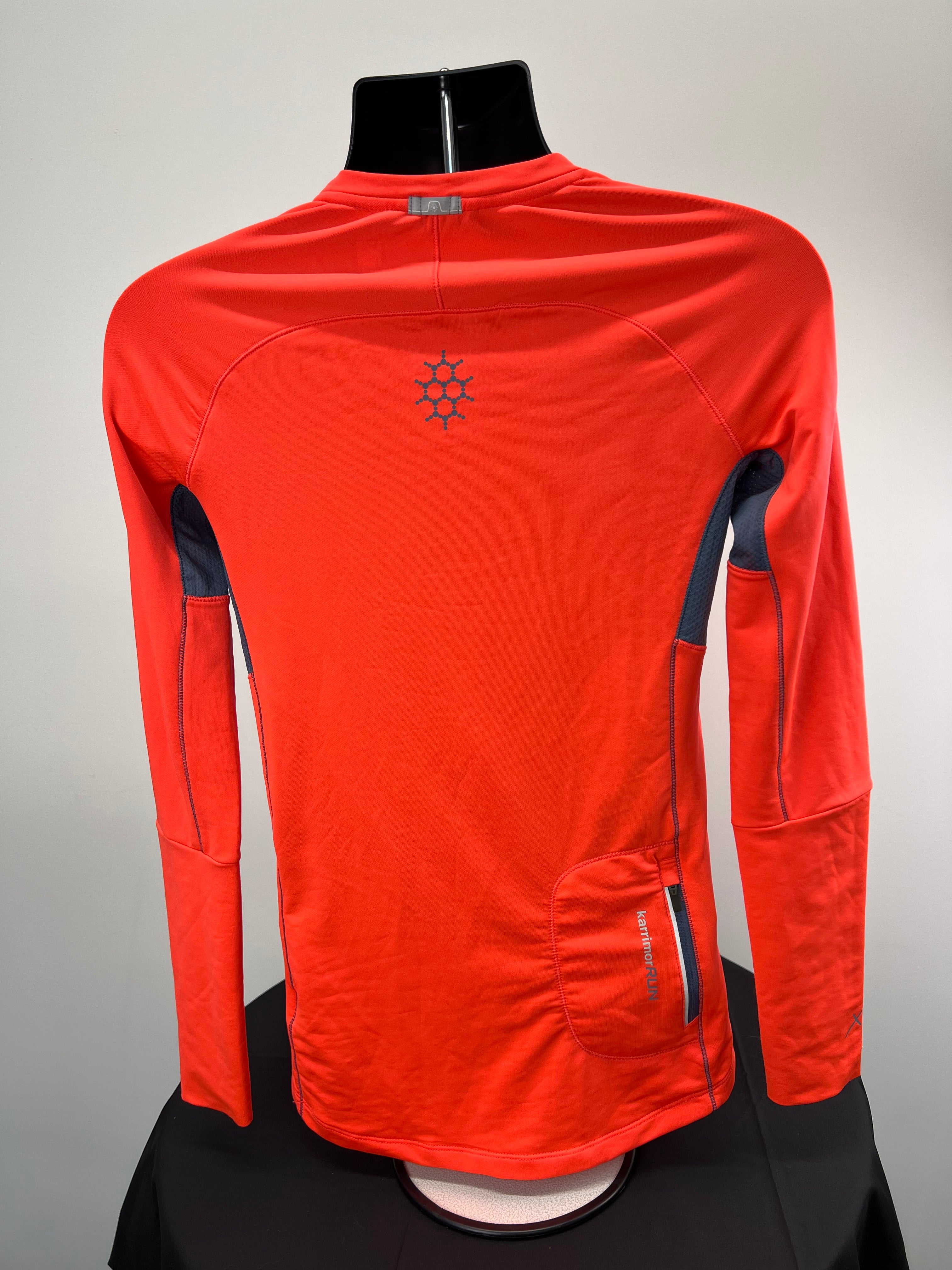 Back view of Karrimor Xlite long sleeve base layer top showing zipped pocket and reflective logo on bright red fabric