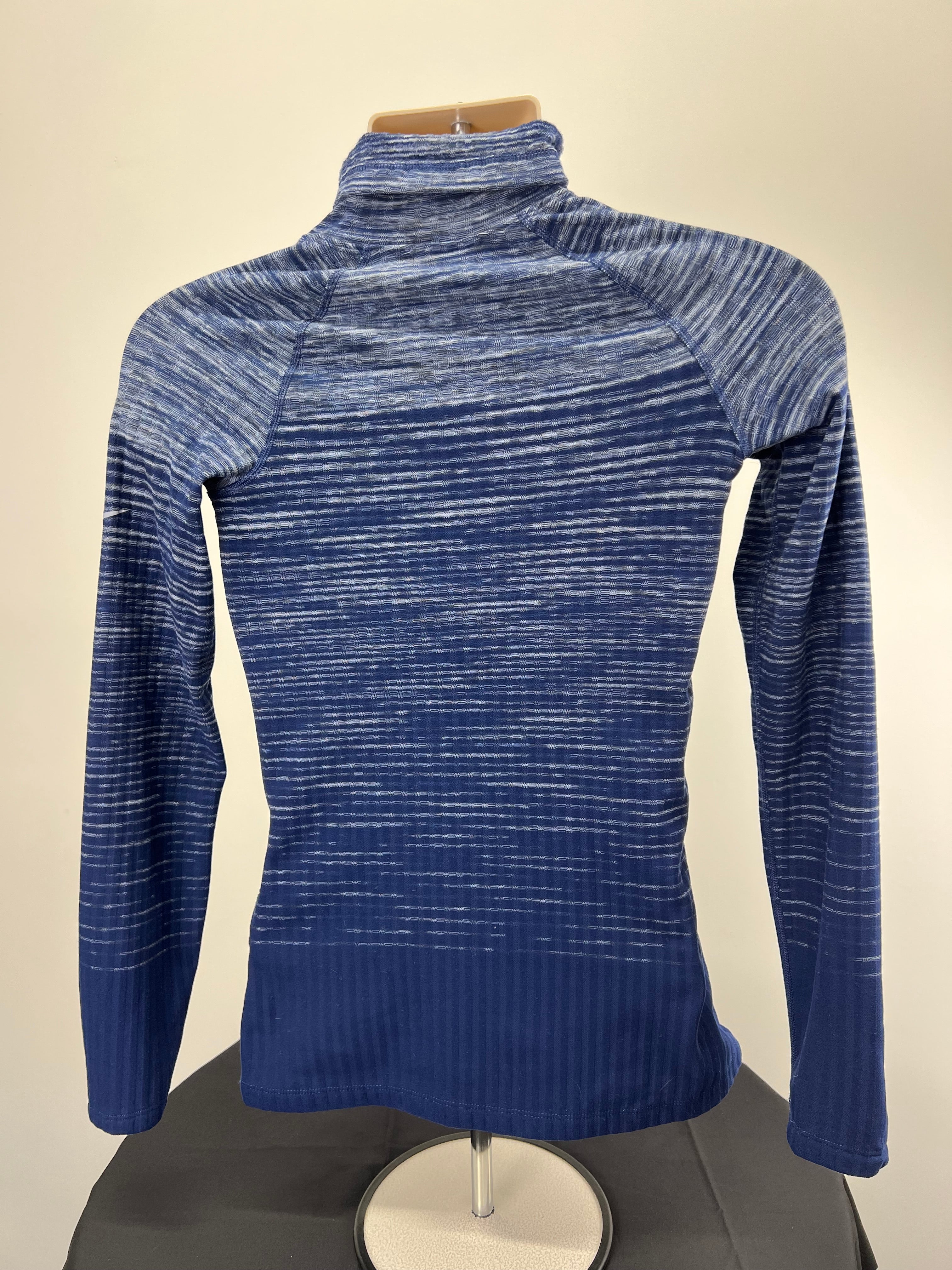 Nike Pro HyperWarm blue funnel neck top front view on mannequin highlighting the textured fabric