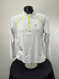 Front view of Babolat white 1/2 zip long sleeve tennis top with neon yellow piping on mannequin