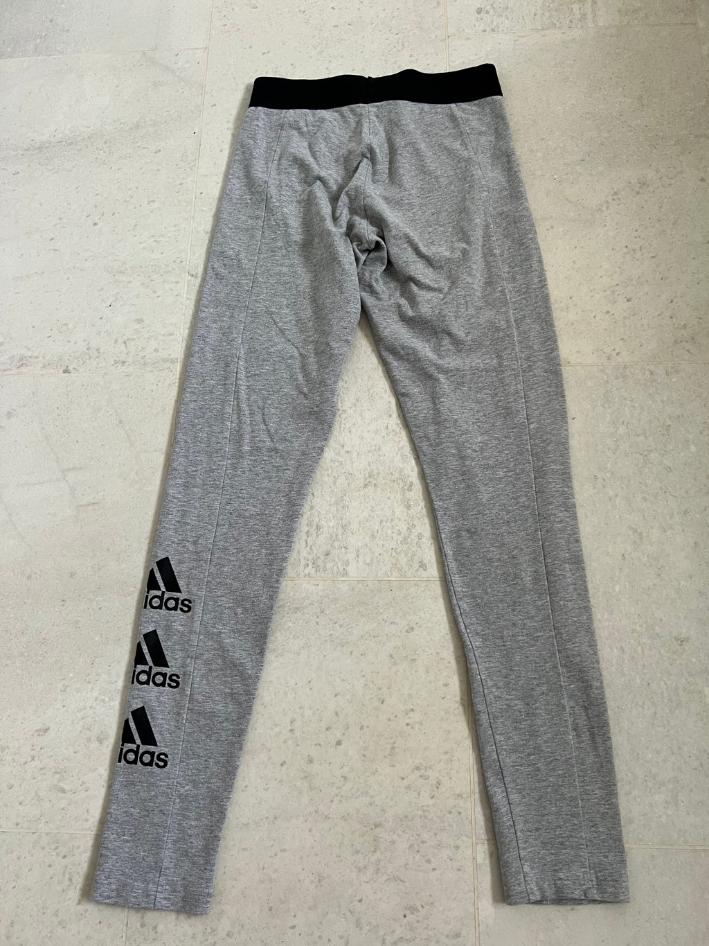 back view of adidas grey leggings showing elasticated waistband
