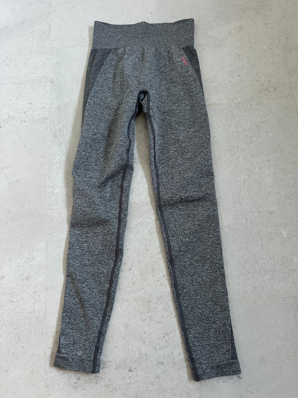 Front view of Gymshark grey marl full length leggings in size S