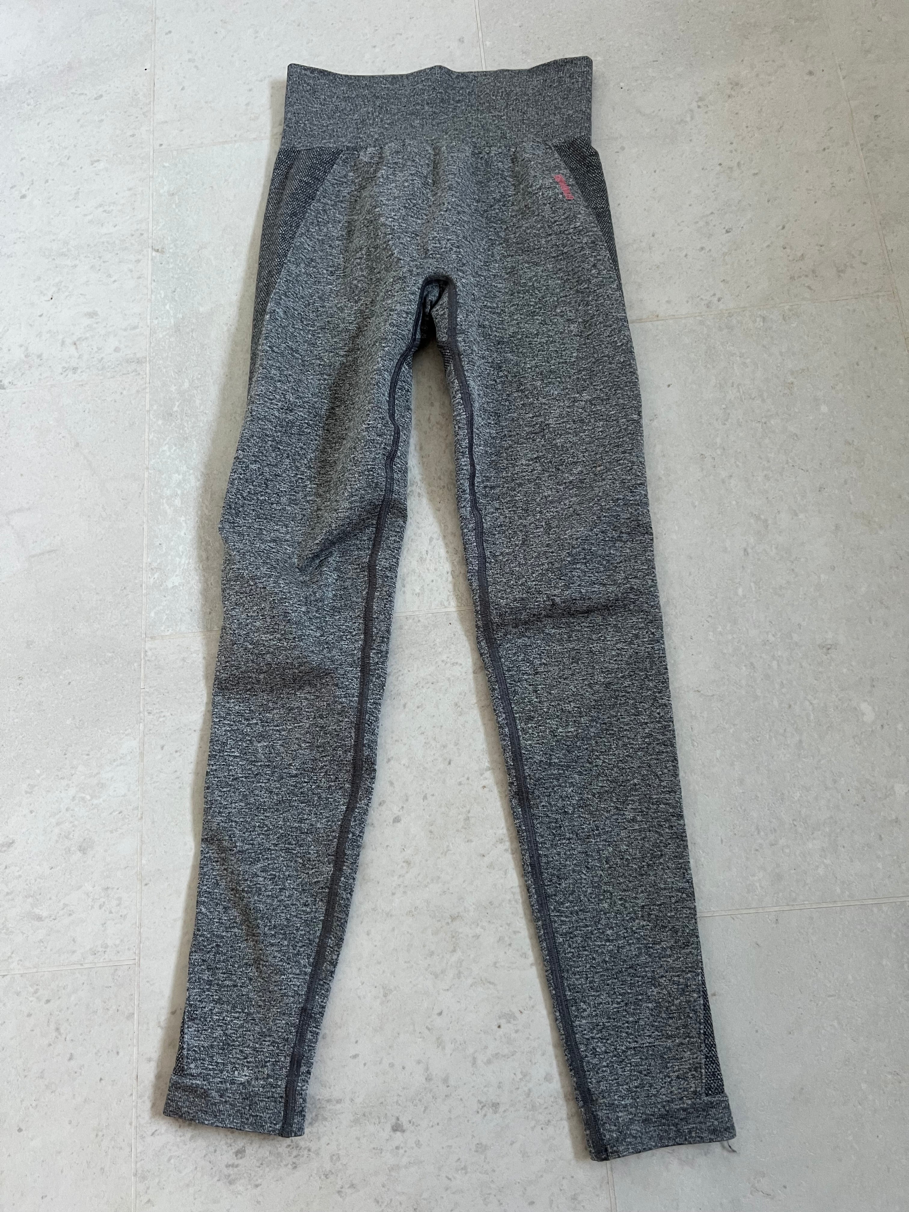 Front view of Gymshark grey marl full length leggings in size S