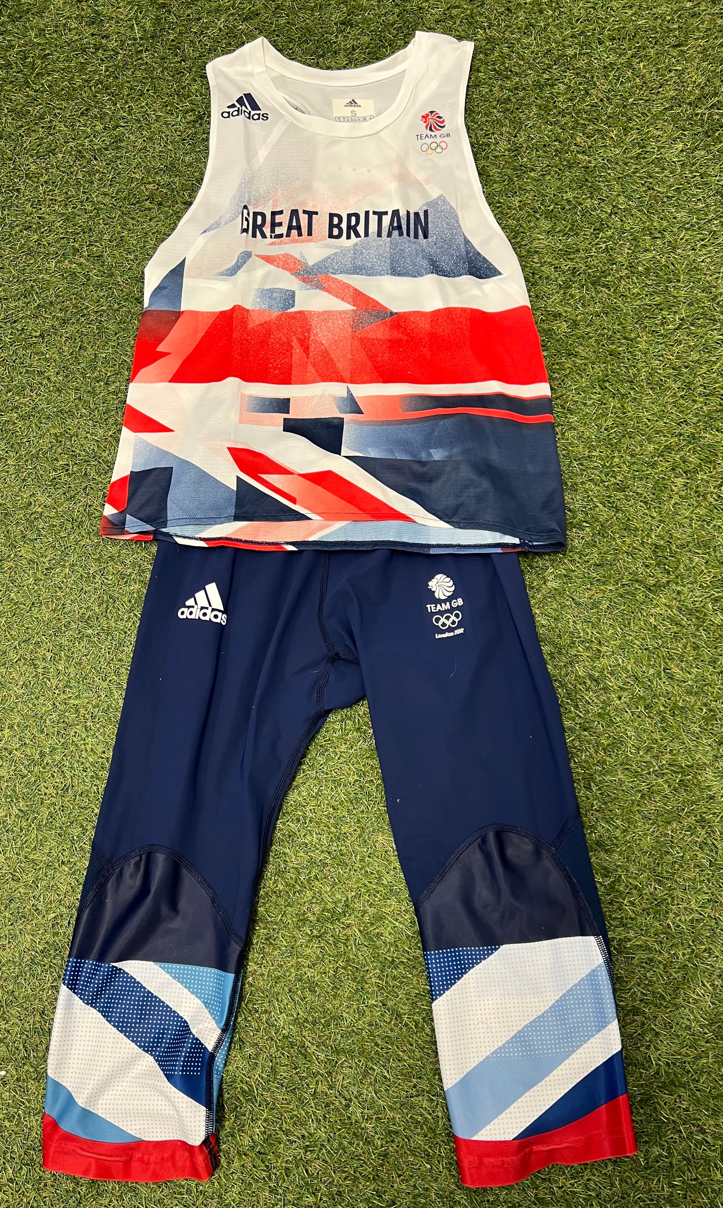 Front view of London 2012 Team GB Adidas vest top and leggings laid flat on grass