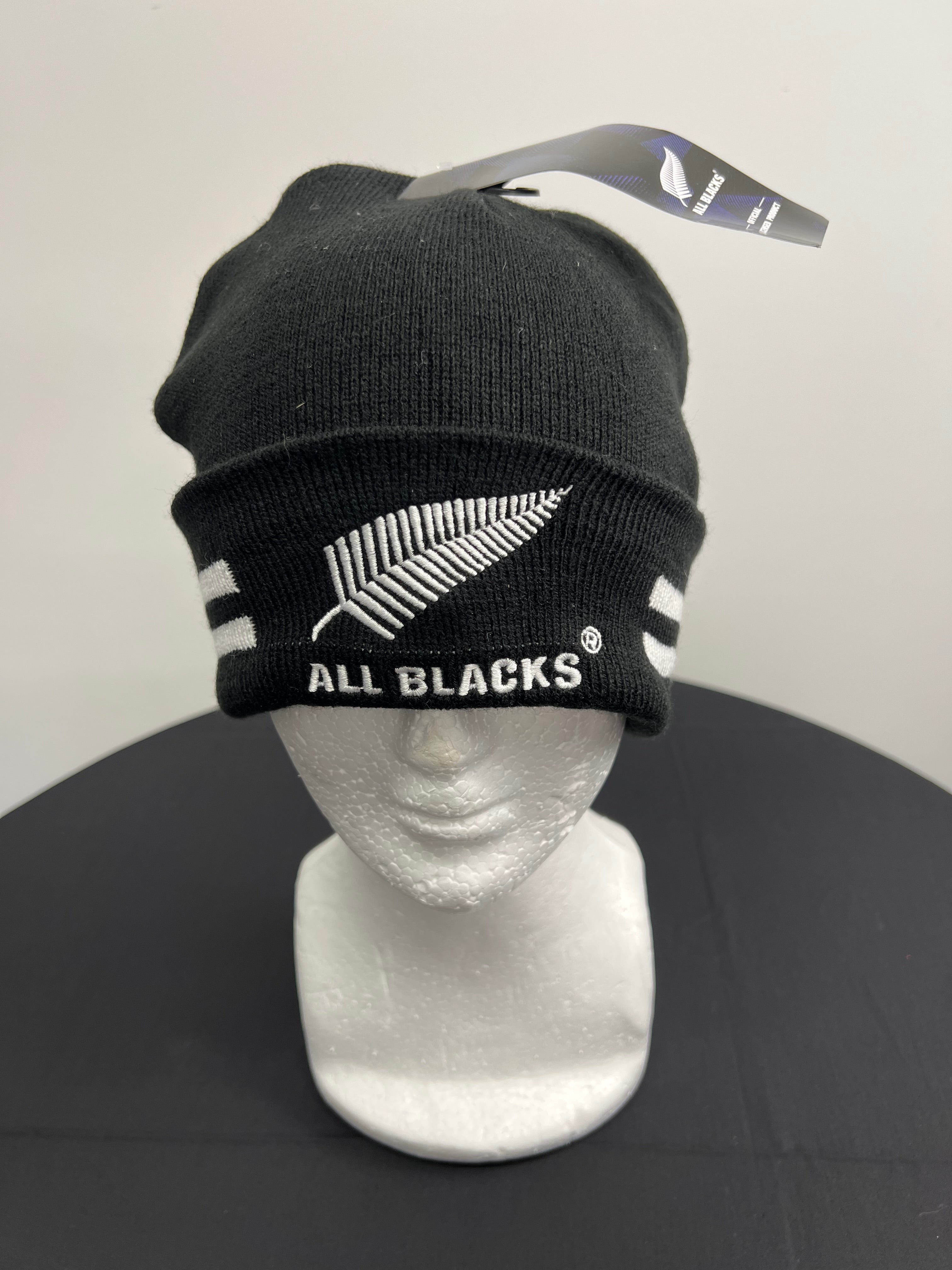 All Blacks beanie worn on a white mannequin head, showing embroidered logo front and centre