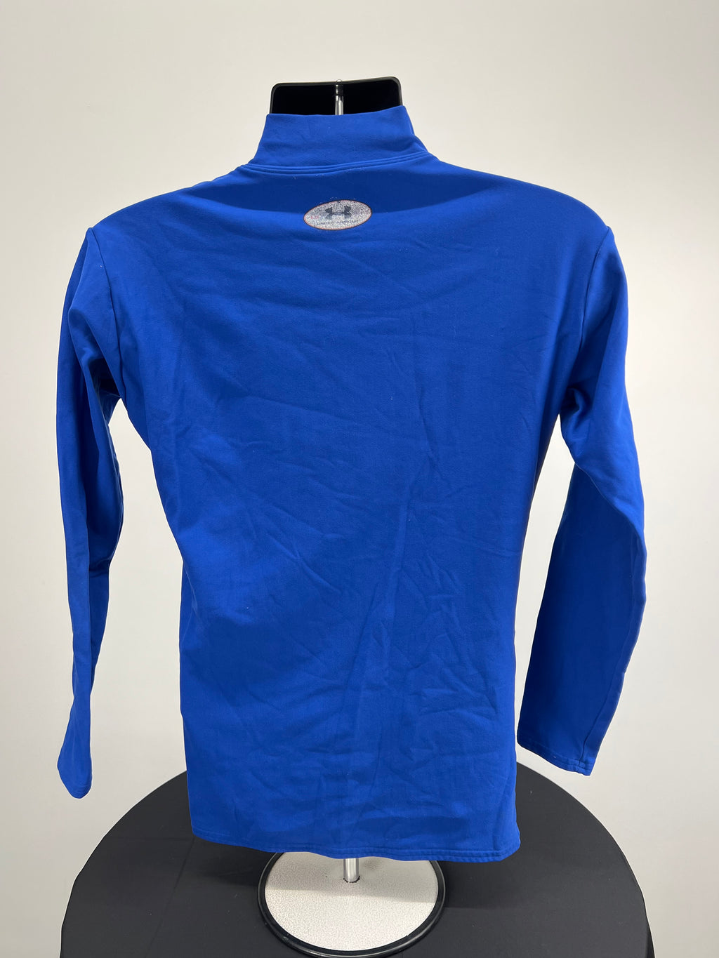 Rear view of blue Under Armour thick base layer top showing back and upper collar details