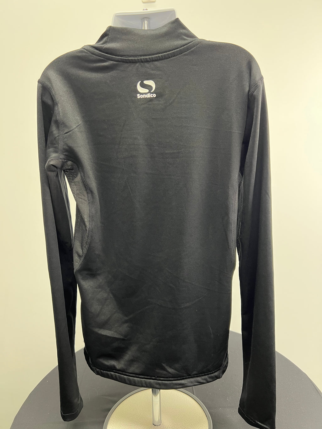 back view of black Sondico kids base layer top showing full back and shoulder logo