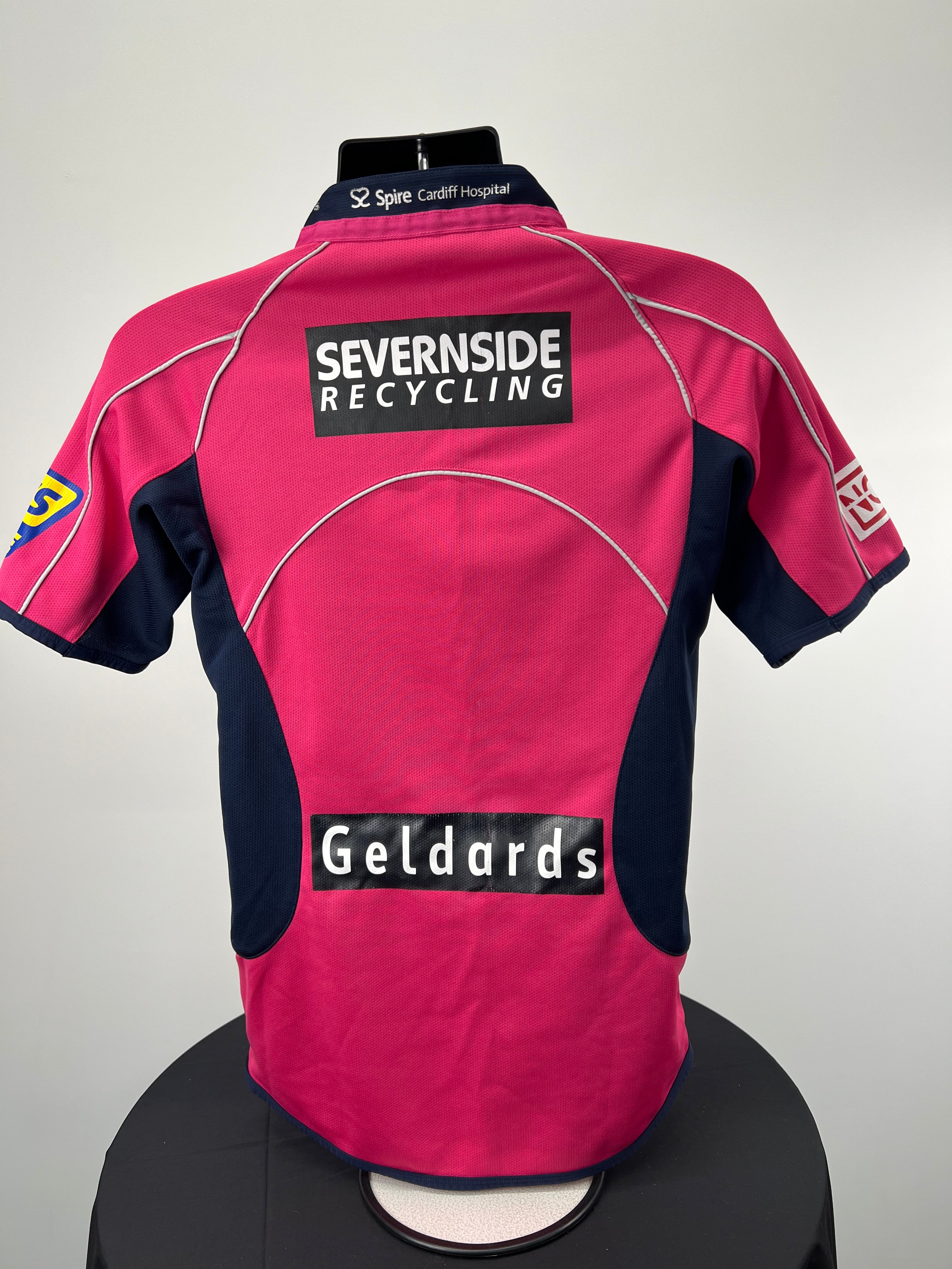 Back view of Cardiff Blues rugby top showing sponsors Severnside Recycling and Geldards, navy accents