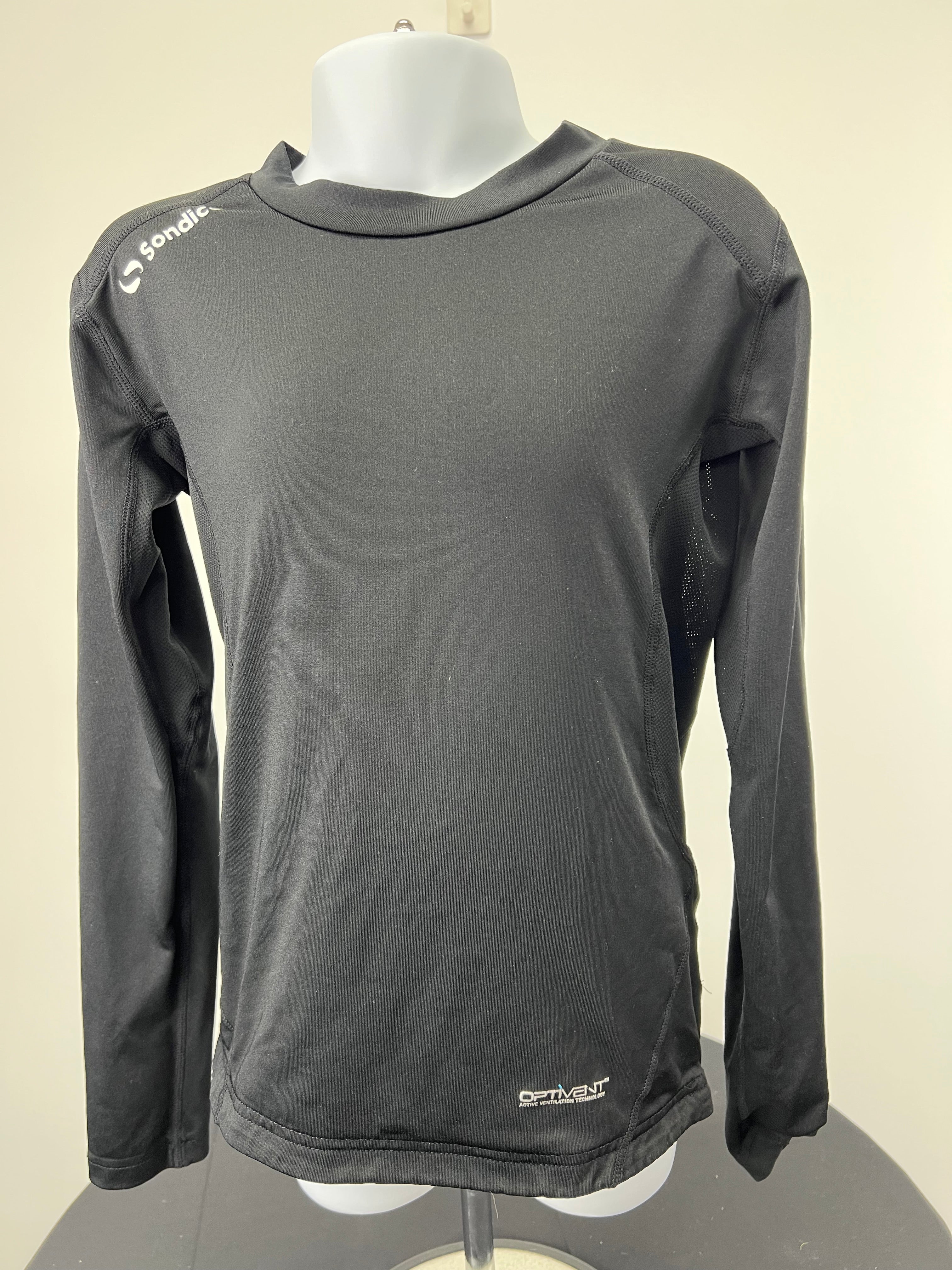 Front view of black kids Sondico base layer with long sleeves on a mannequin