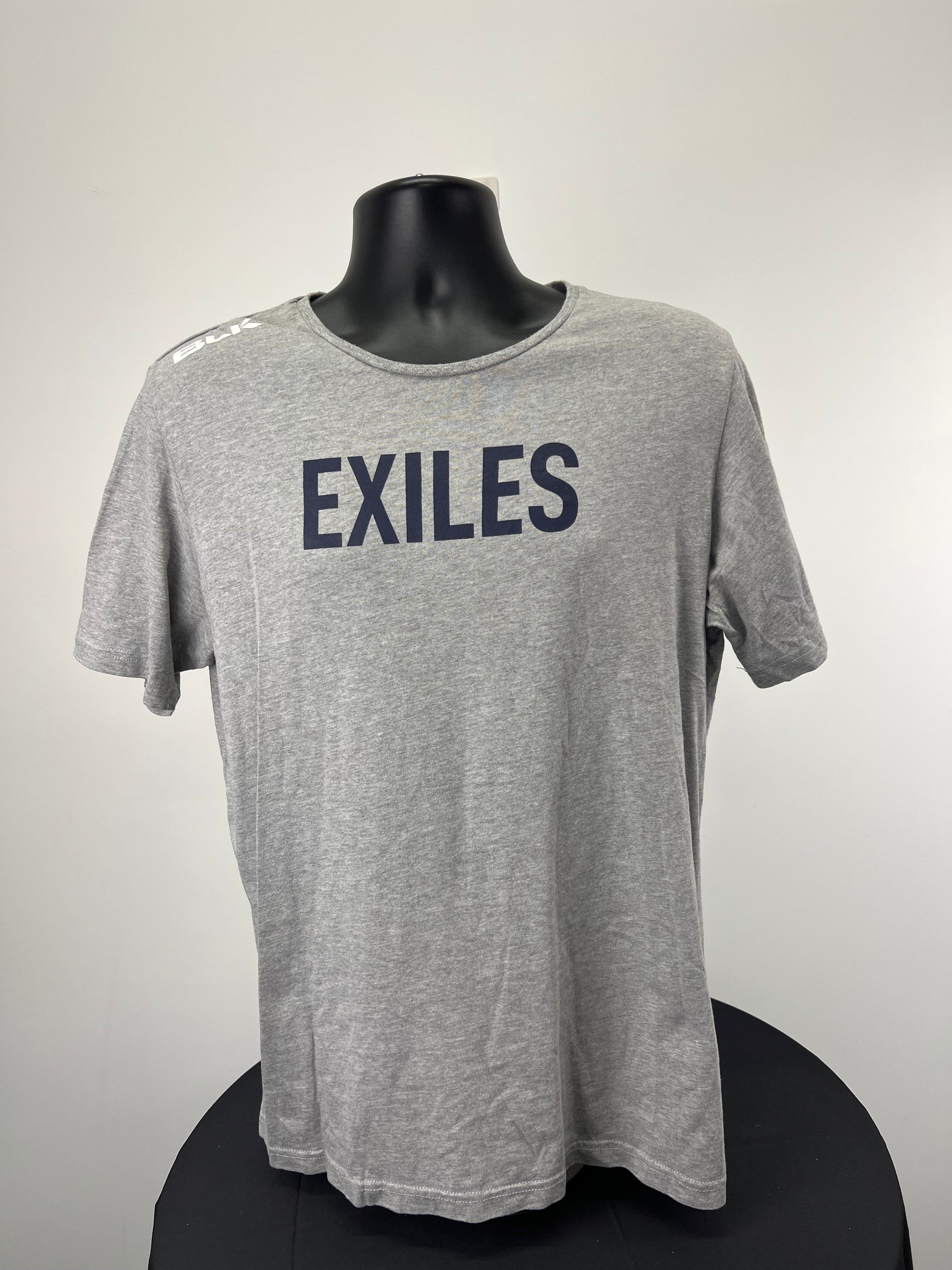 Front view of men’s grey Exiles t-shirt with navy logo on chest displayed on a black mannequin