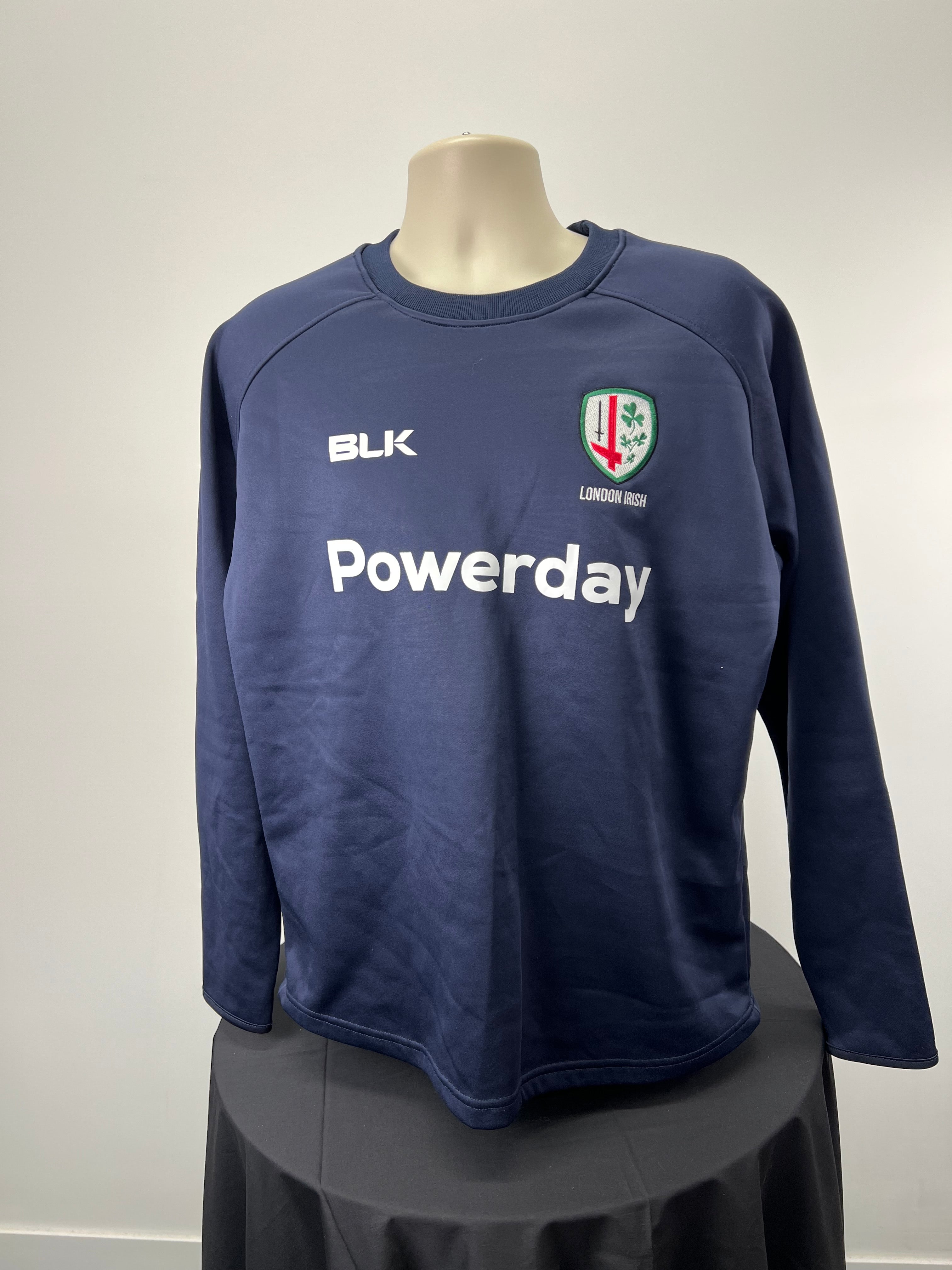 Front view of men's dark blue London Irish sweatshirt with BLK logo and Powerday printed on front