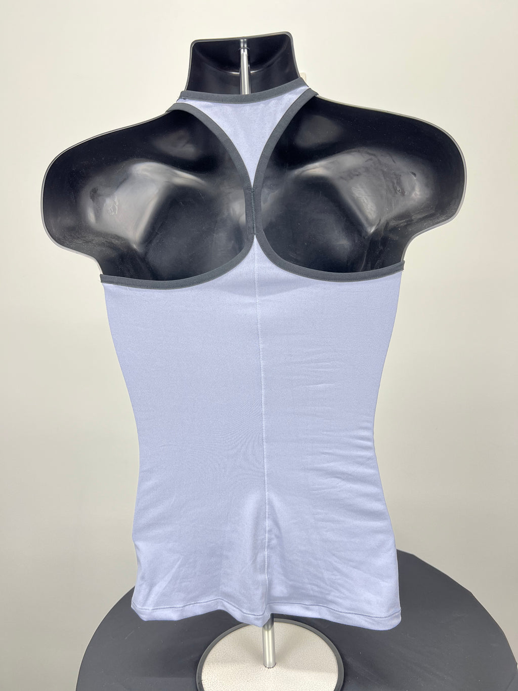 Back view of grey Reebok x Les Mills vest top showing racerback design