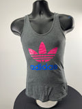 Front view of women's adidas grey training vest with pink and blue Trefoil logo on black mannequin