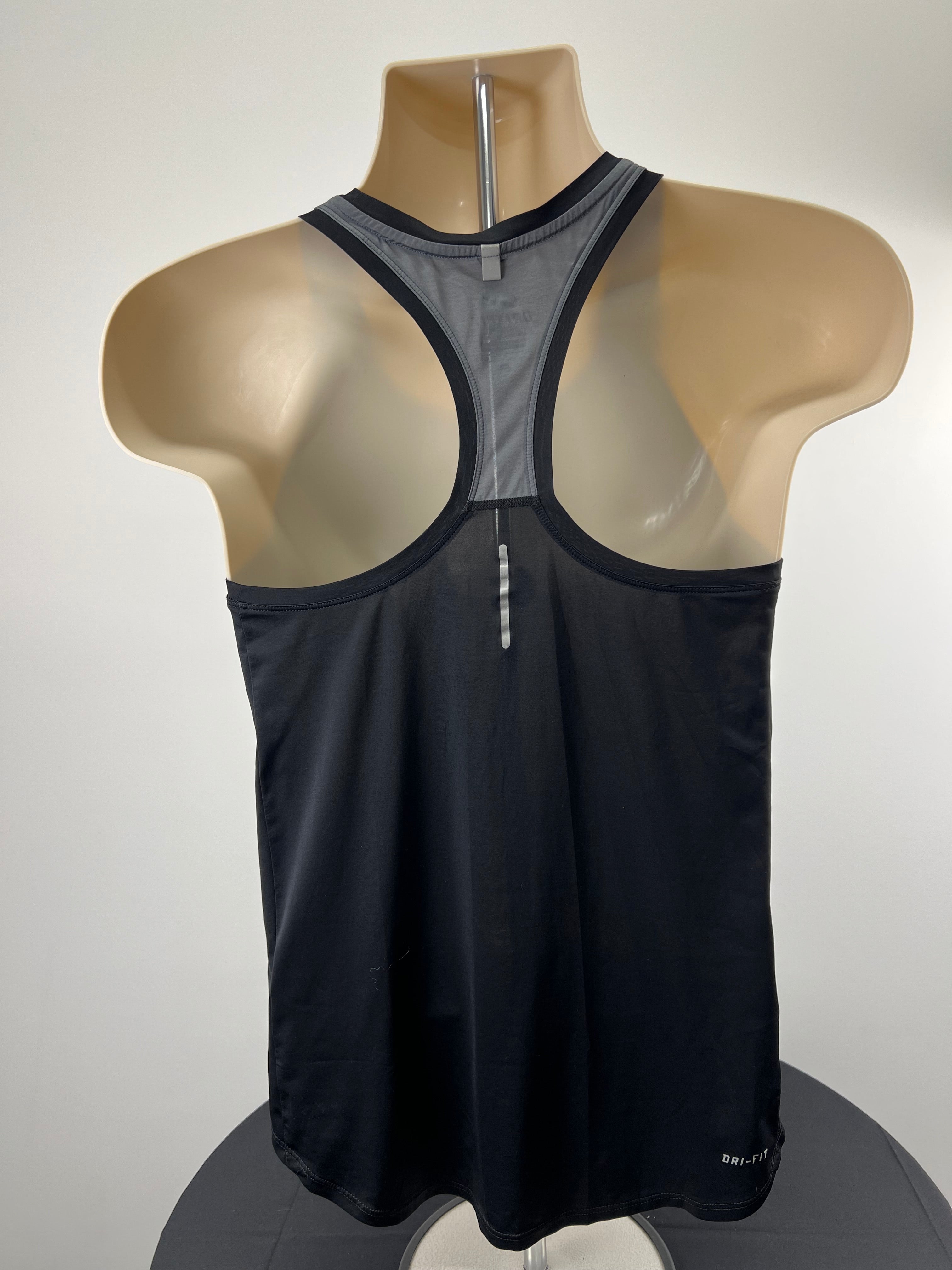 Back view of black Nike racer back vest showing grey detailing and reflective strip