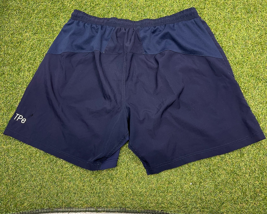 Back view of the sports shorts showing breathable mesh and elastic waistband