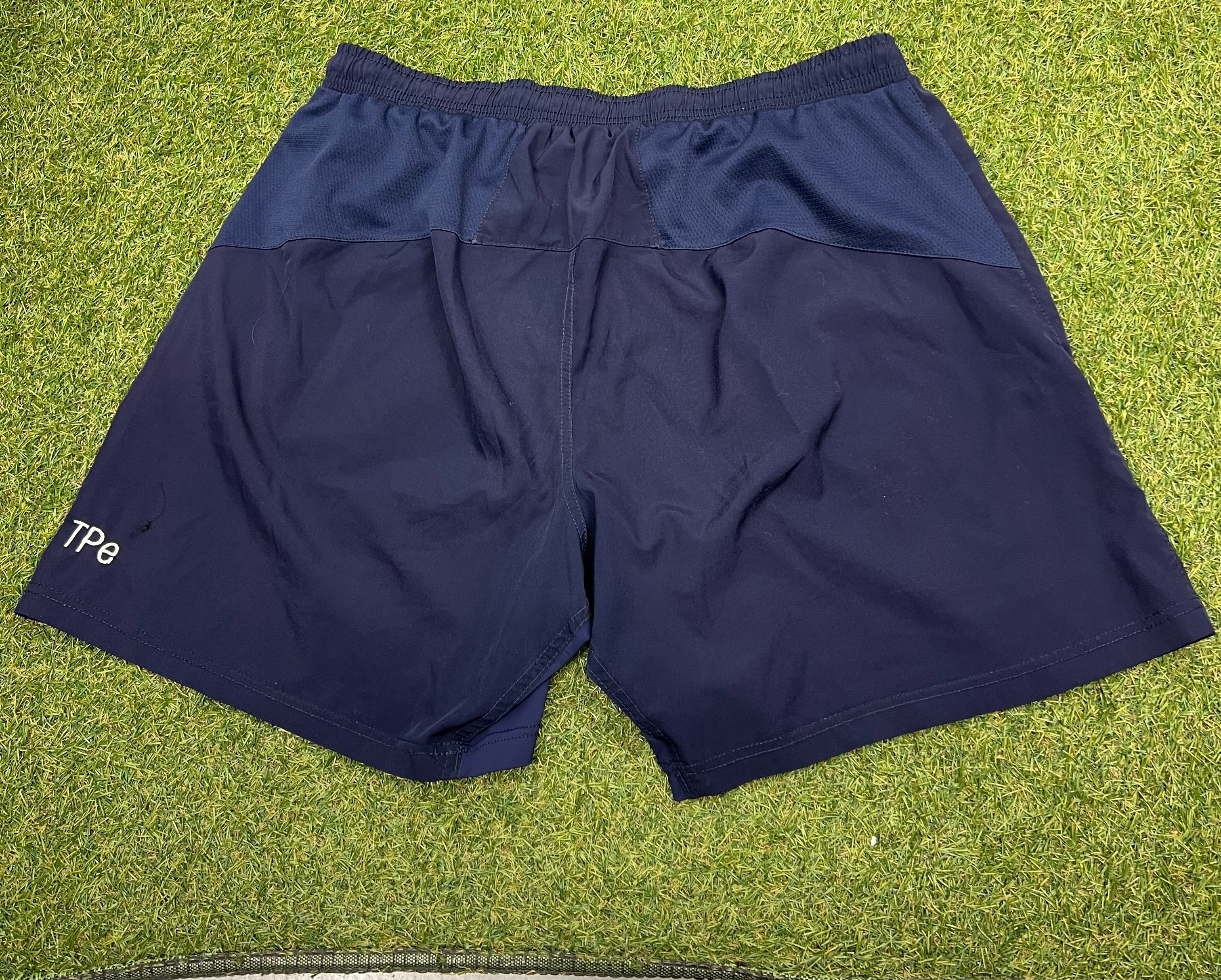 Back view of the sports shorts showing breathable mesh and elastic waistband