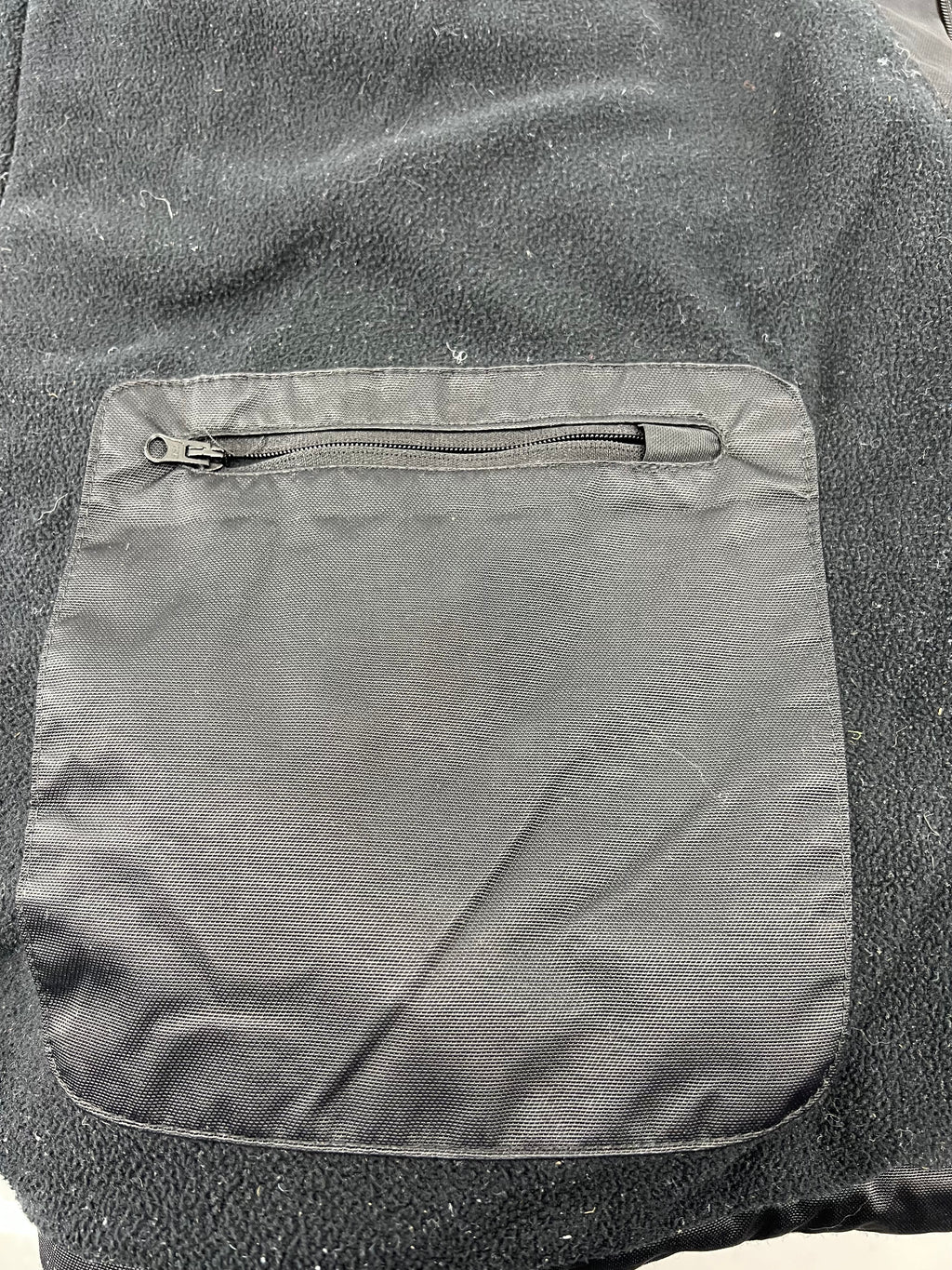 Inside fleece lining pocket with zipper on black jacket