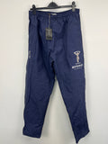 Harlequin rugby club dark blue tracksuit bottoms front view hanging on black hanger