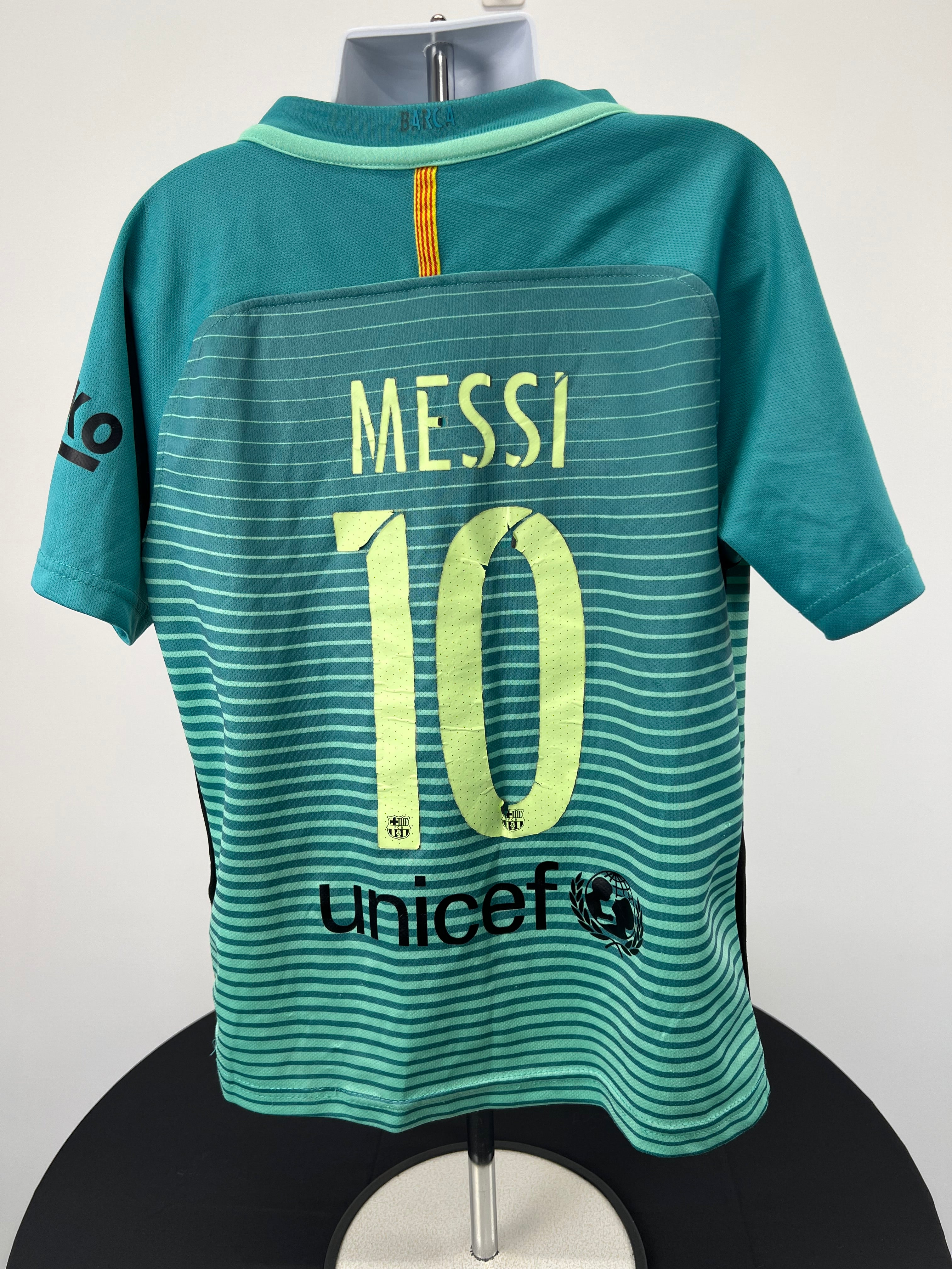 Back view of Kids FC Barcelona football shirt with Messi 10 printed in yellow-green and UNICEF logo