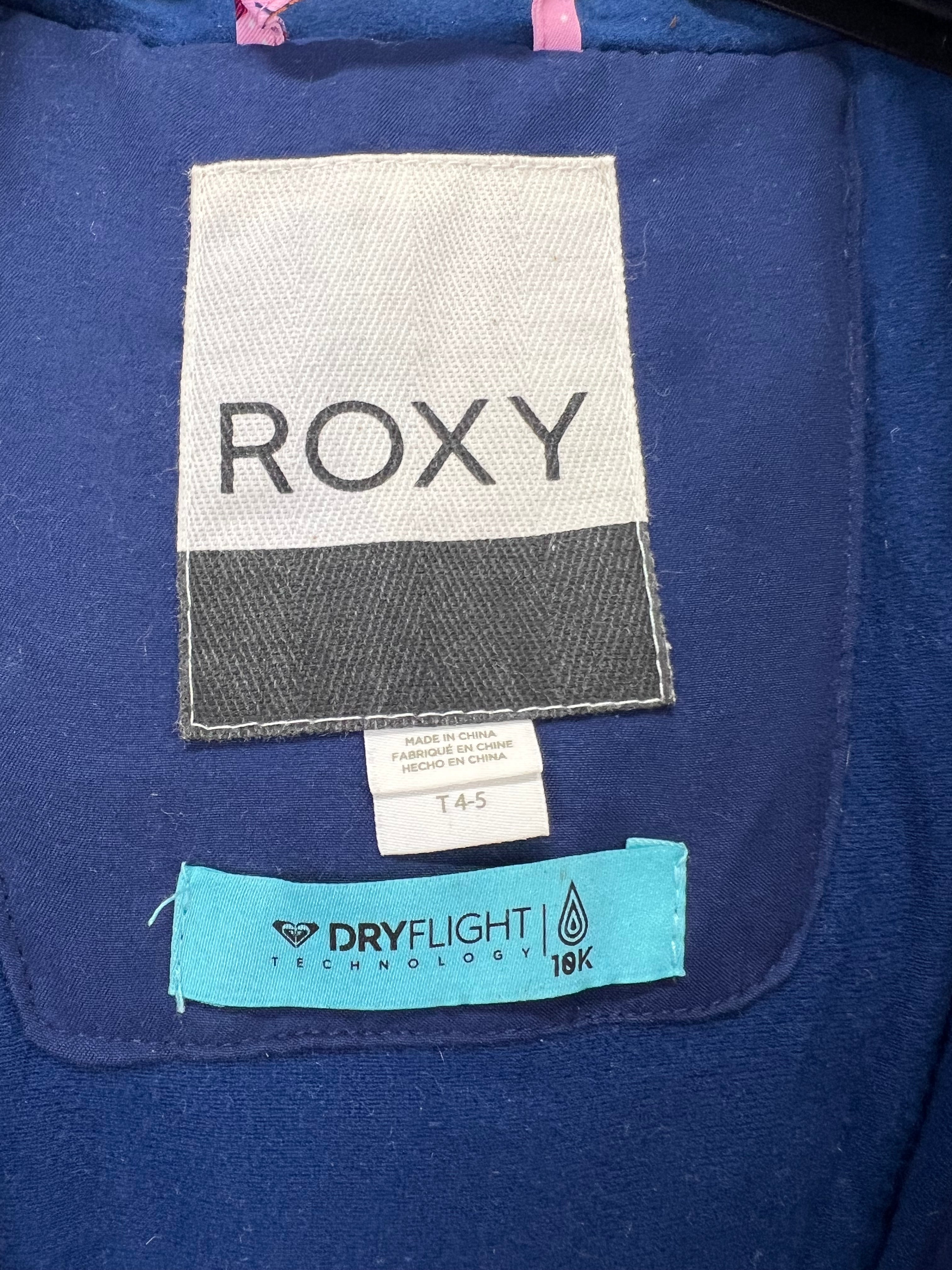 Close-up of Roxy brand label and blue DryFlight 10K waterproof technology tag inside the snow suit