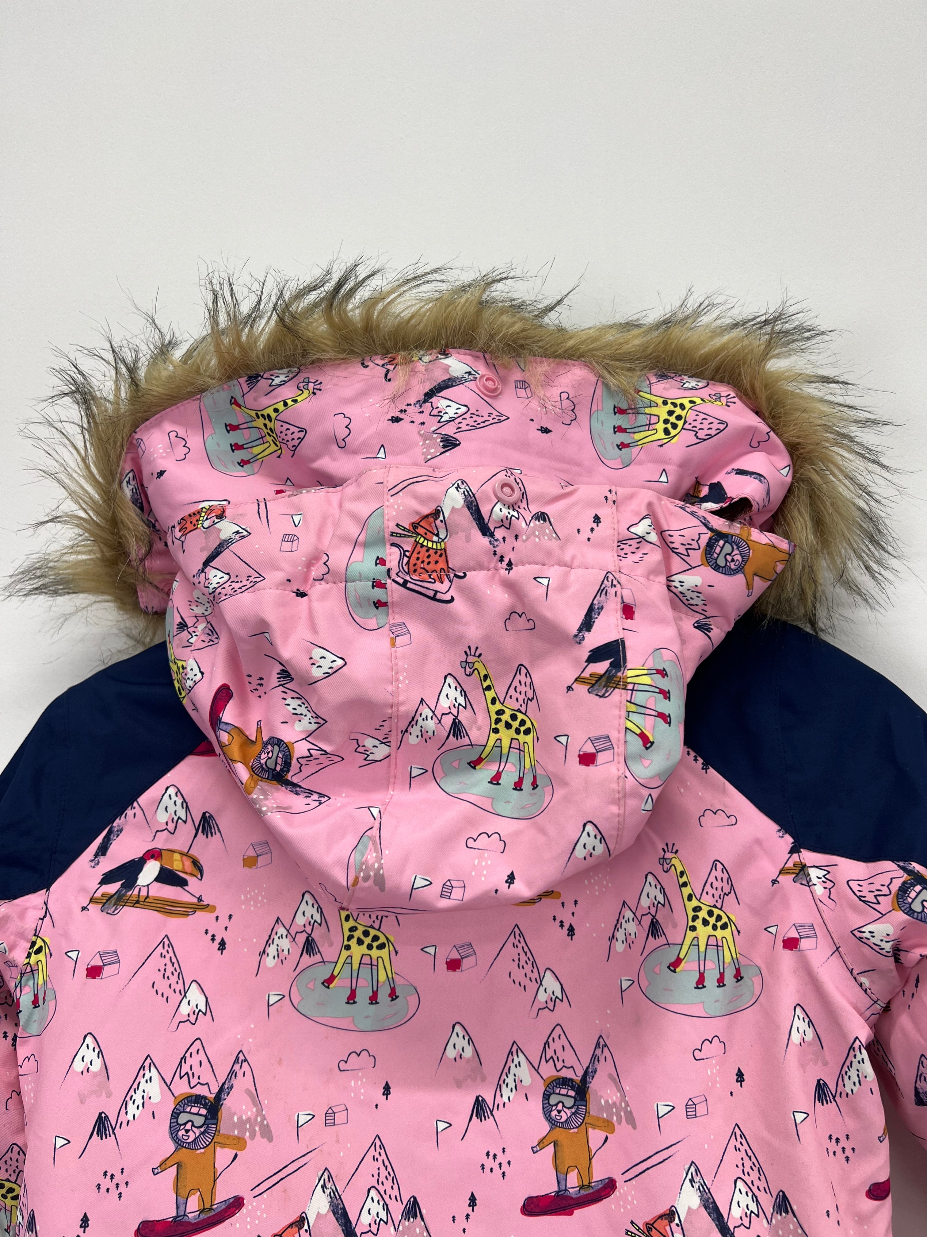 Close-up of detachable hood with faux fur trim and detailed pink patterned fabric featuring skiing animals and toucans