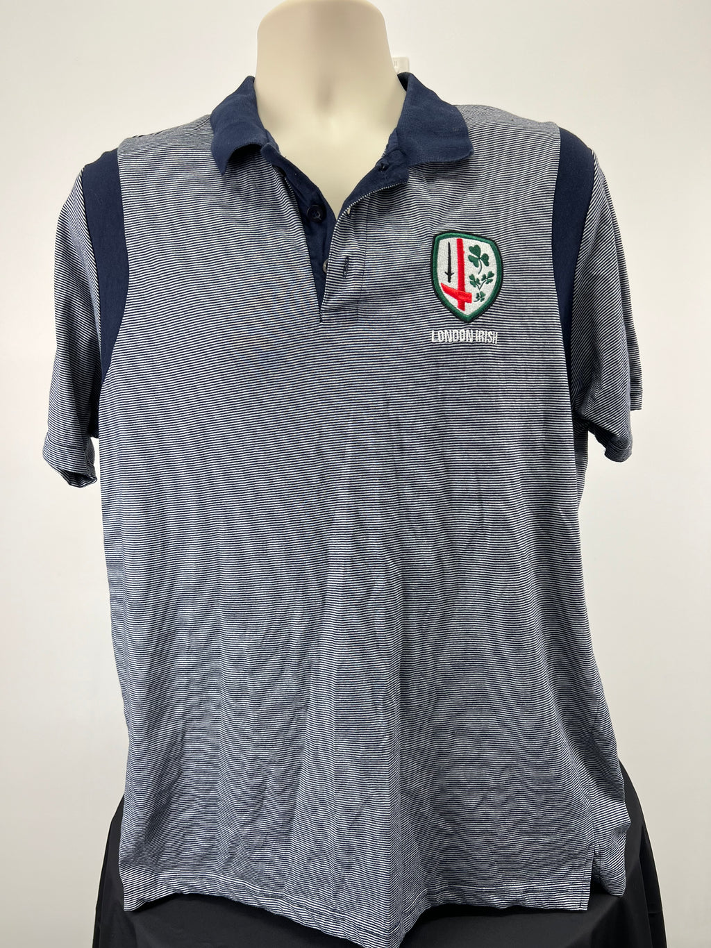 Front view of Men’s London Irish XXL polo top with navy collar and embroidered crest