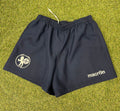 Front view of navy men’s NATO Lions RFC shorts laid flat showing logo and Macron brand