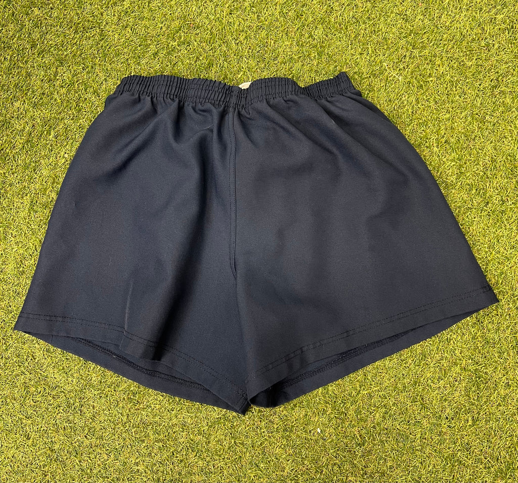 Back view of navy men’s NATO Lions RFC shorts showing clean, solid design
