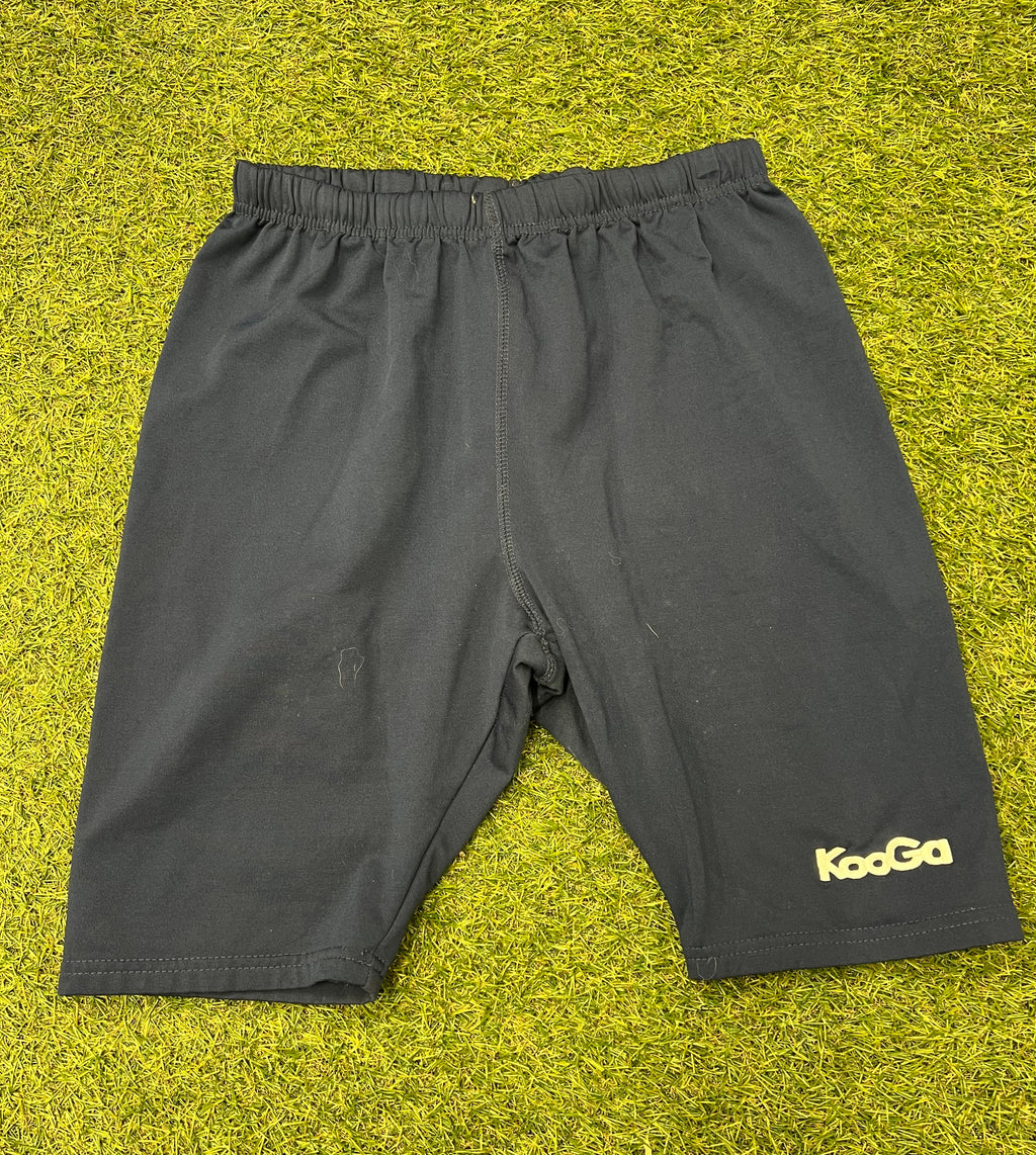Front view of navy blue KooGa fleece lined rugby shorts on grass surface