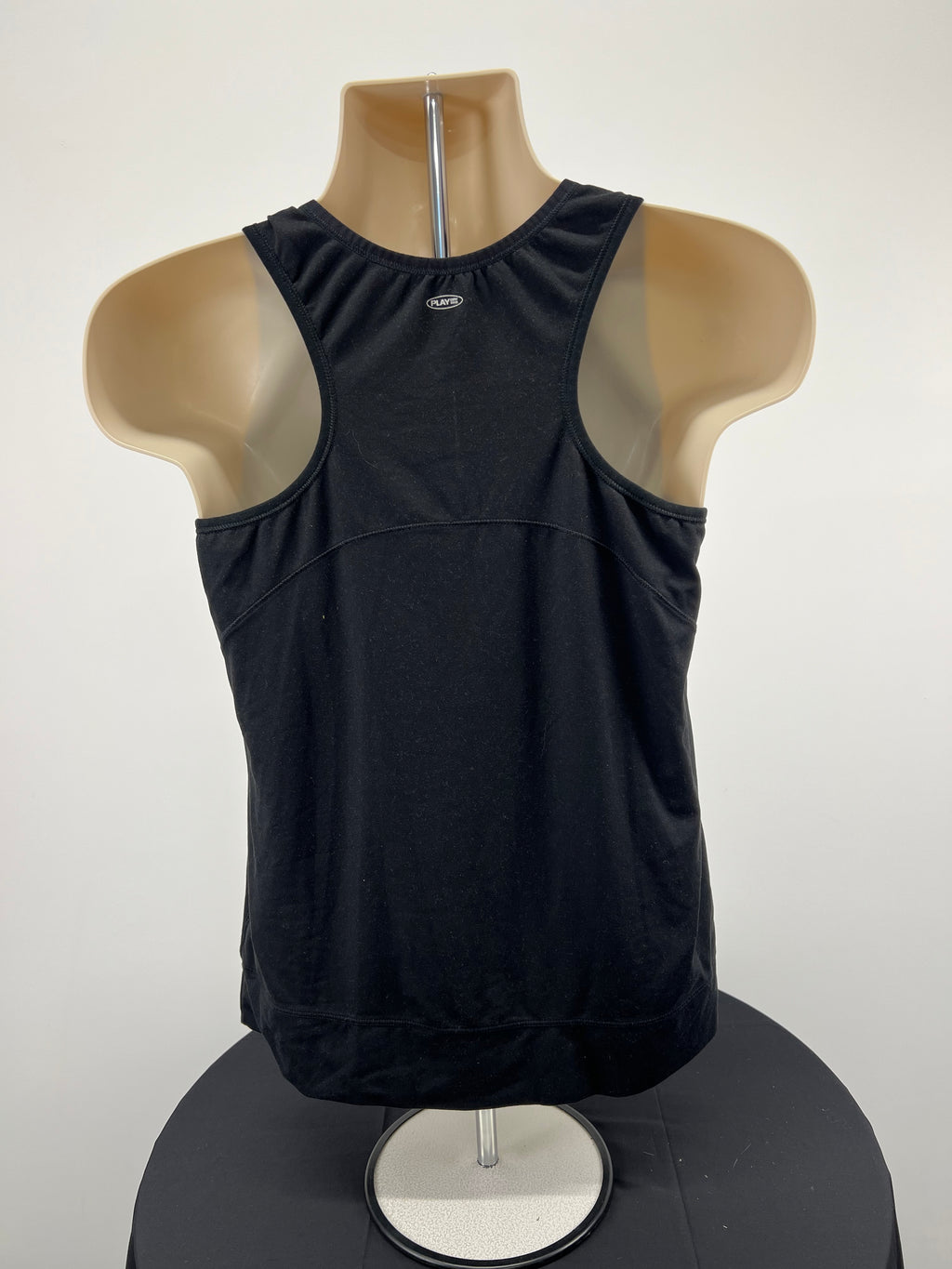 Back view of Reebok black sports vest showing racerback design