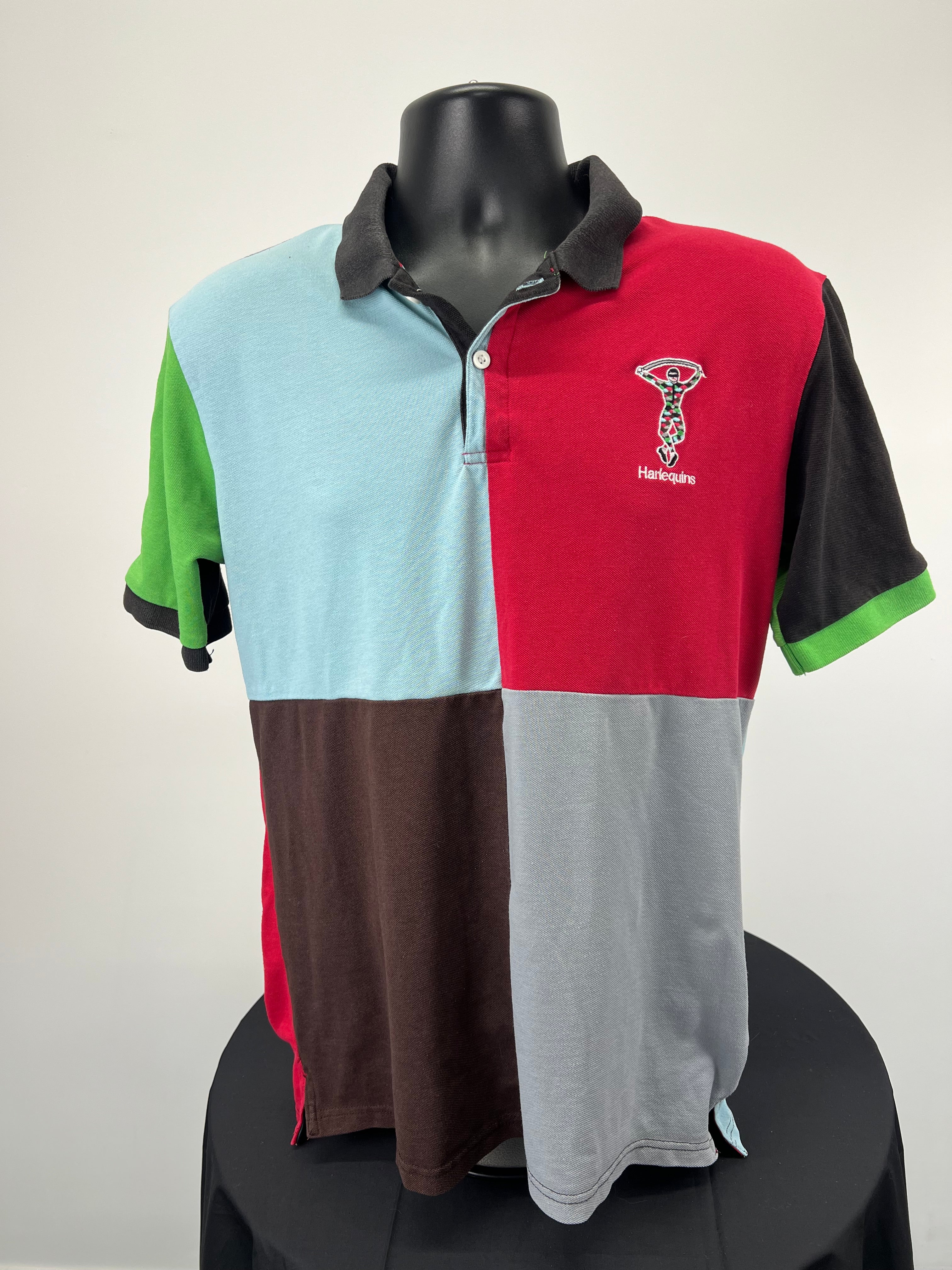 Front view of Harlequins rugby club polo shirt in red, blue, brown, grey, black and green blocks with embroidered club logo