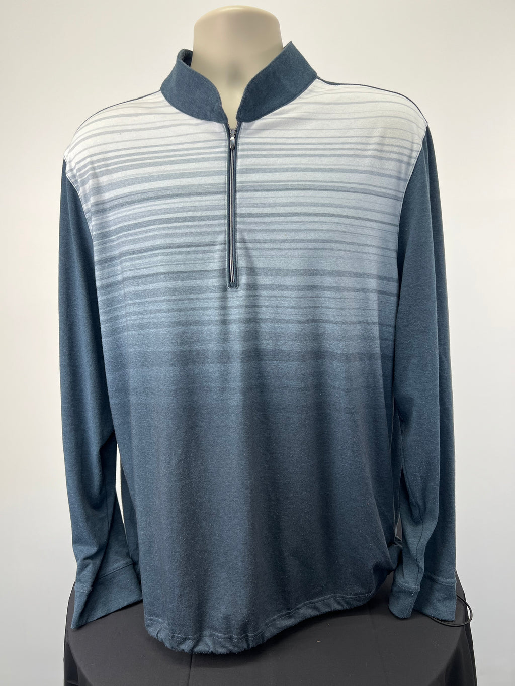 Front view of Greg Norman long sleeve golf jumper with white to grey gradient and half zip