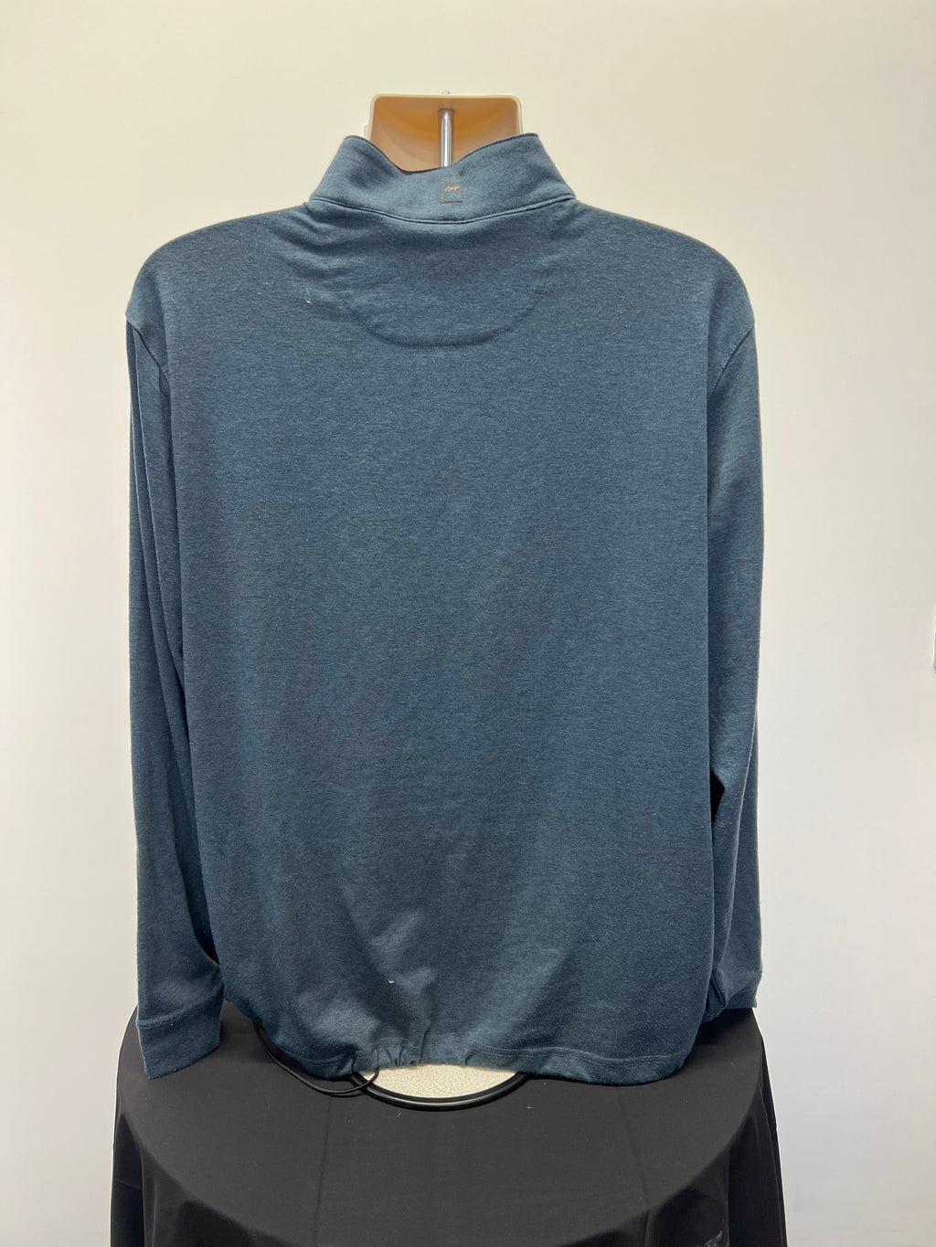 Back view of Greg Norman golf jumper in solid grey with GN logo on collar