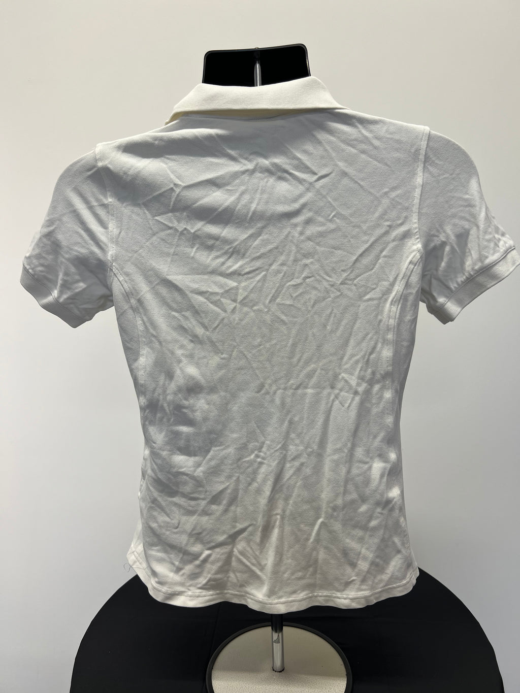 Back view of Women’s Galvin Green white polo shirt showing smooth fabric and collar