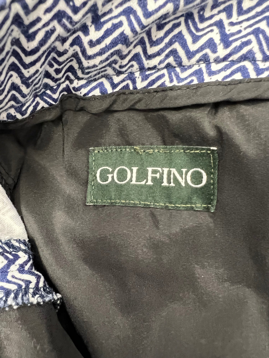 Close-up of the Golfino brand label inside the patterned trousers