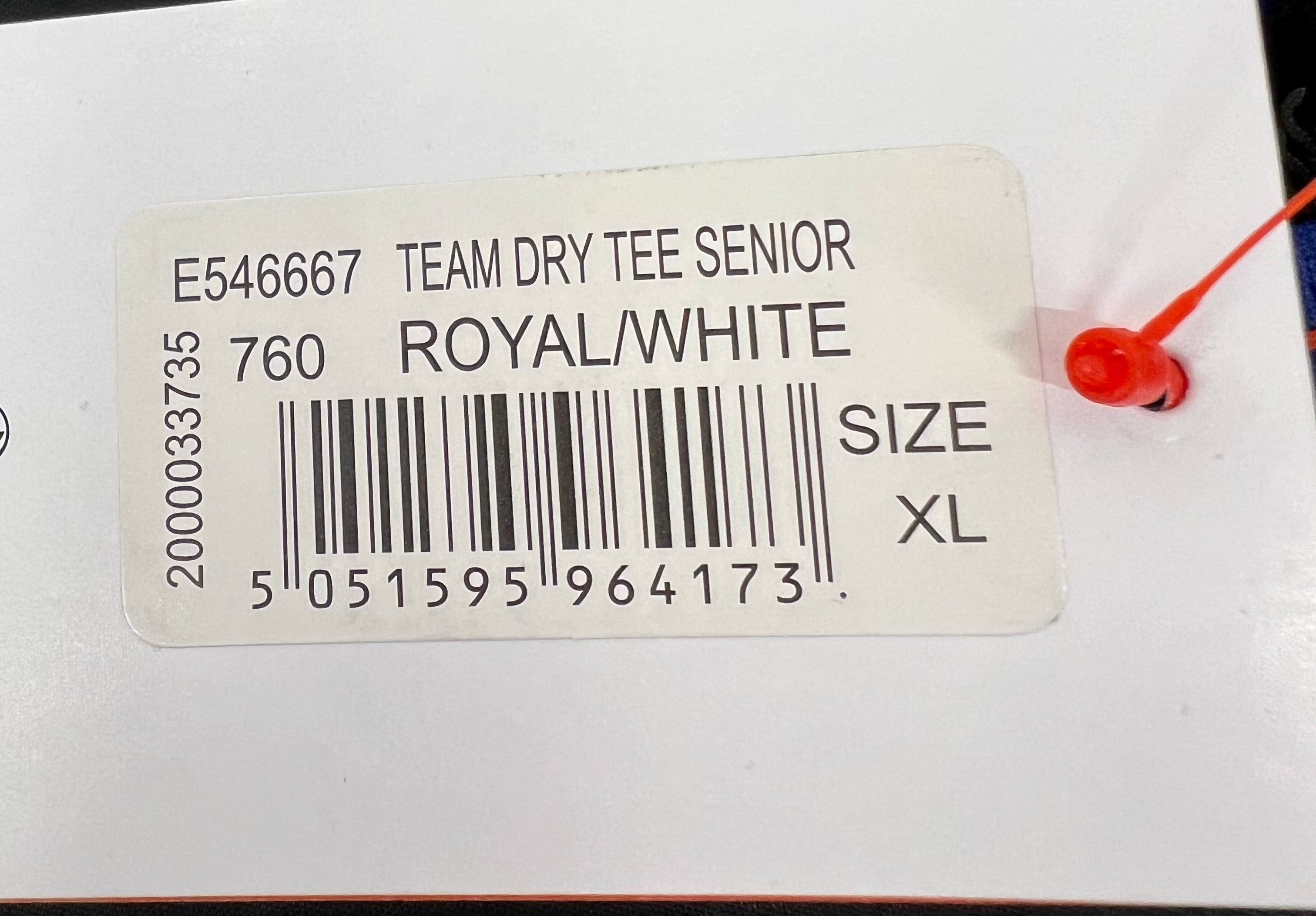 Close-up of product label showing size XL and colour Royal/White
