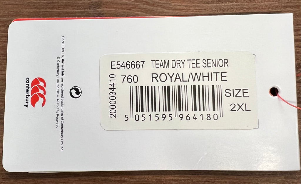 Close-up of product tag detailing size 2XL, royal/white colour, and Canterbury branding