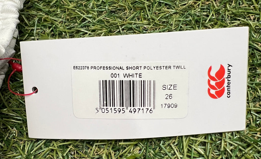 Close-up of Canterbury product tag showing size 26 professional polyester twill rugby shorts white