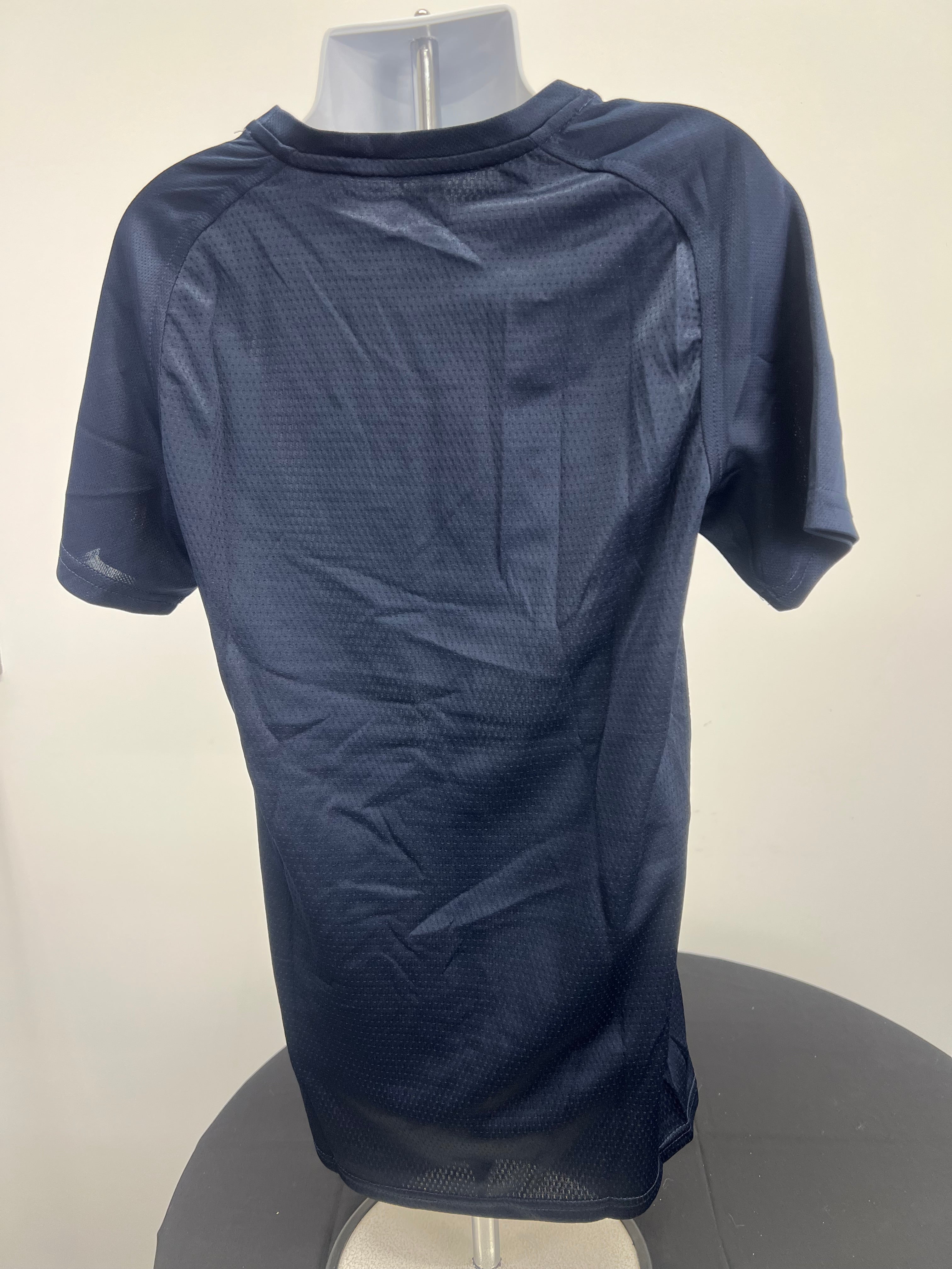 Back view of Kids Canterbury navy team dry sports tee showing breathable fabric