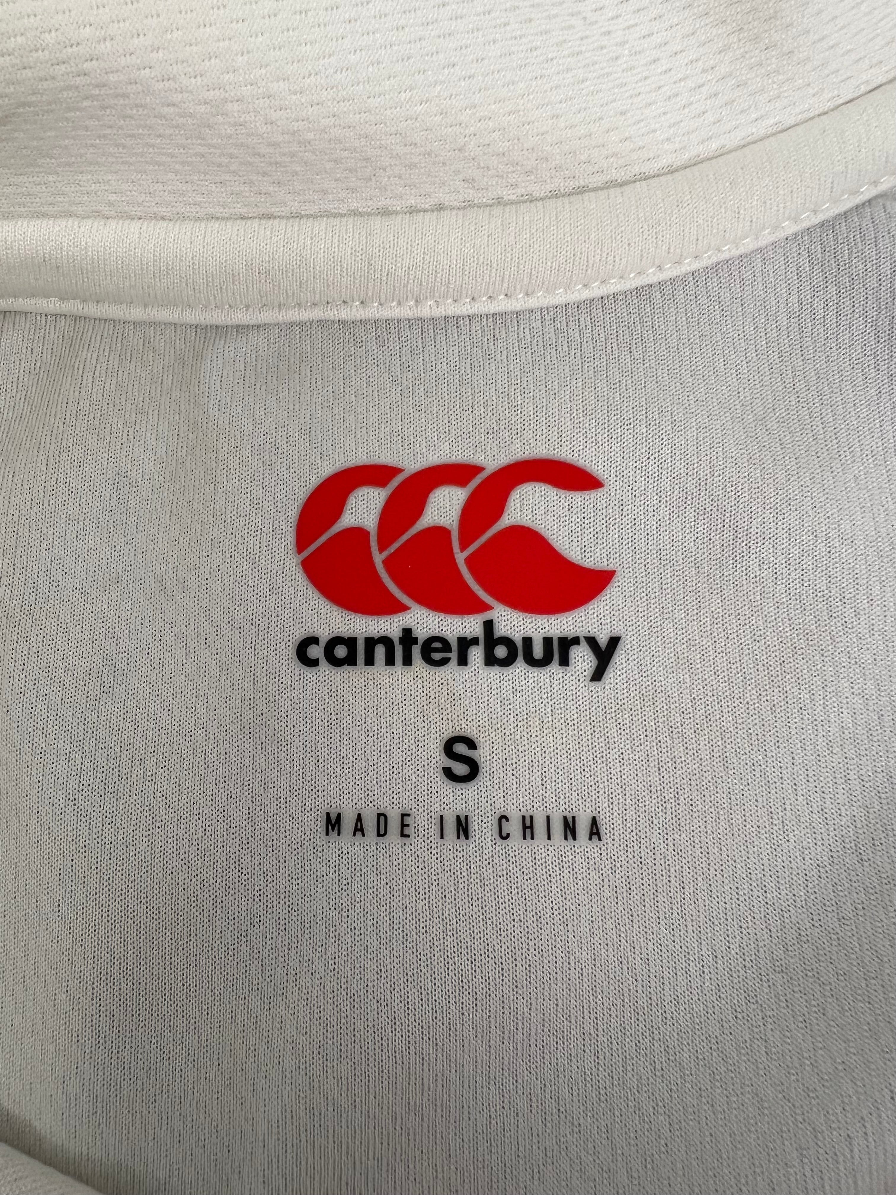 Close-up of inside neck label of Canterbury cricket shirt size small