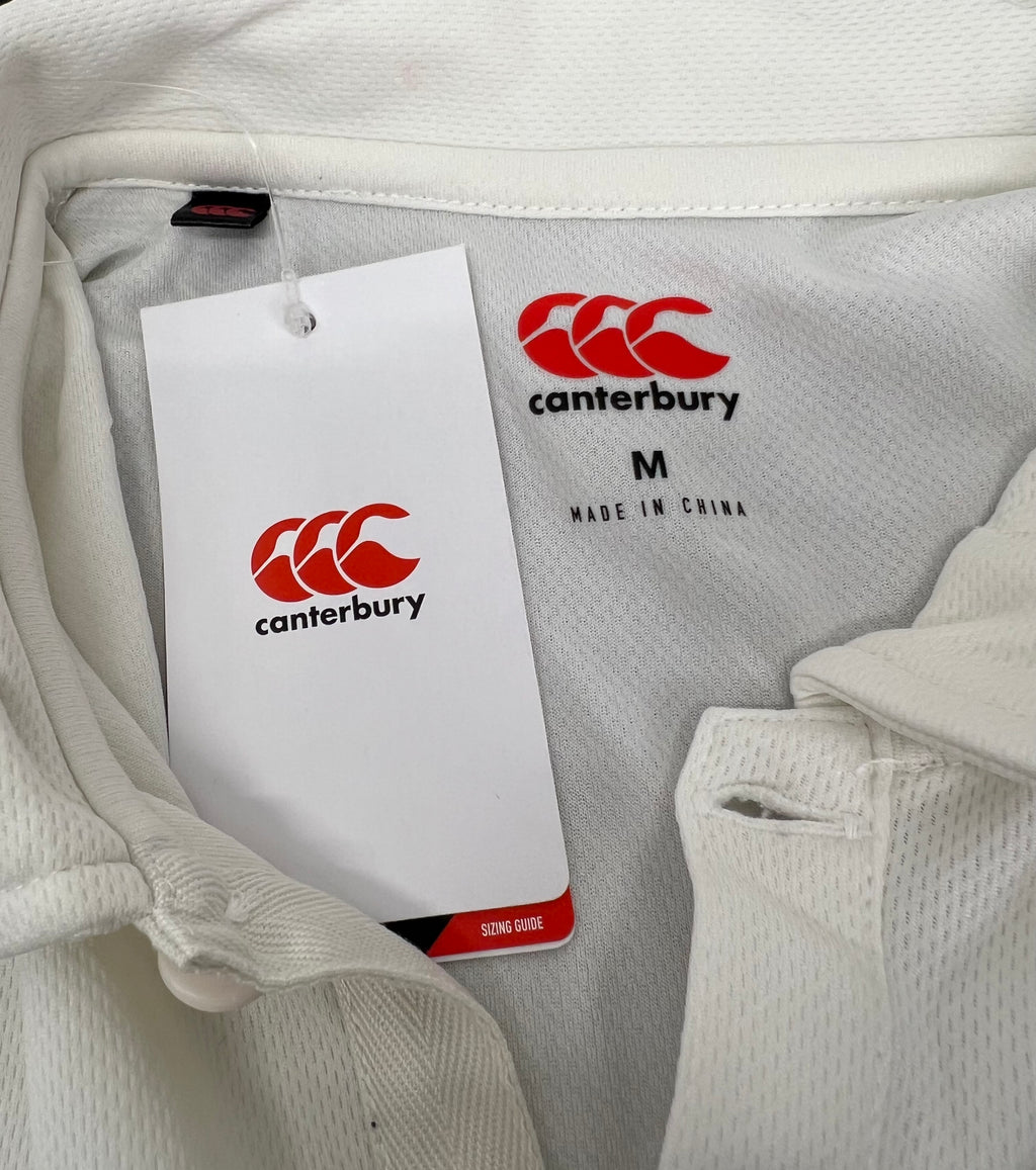 Canterbury cricket shirt cream size M label and tag close-up