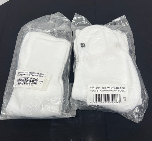 Two pairs of white Canterbury socks in plastic packaging, size small
