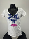 Nike slim fit V neck white t-shirt with navy and pink print on the front displayed on mannequin