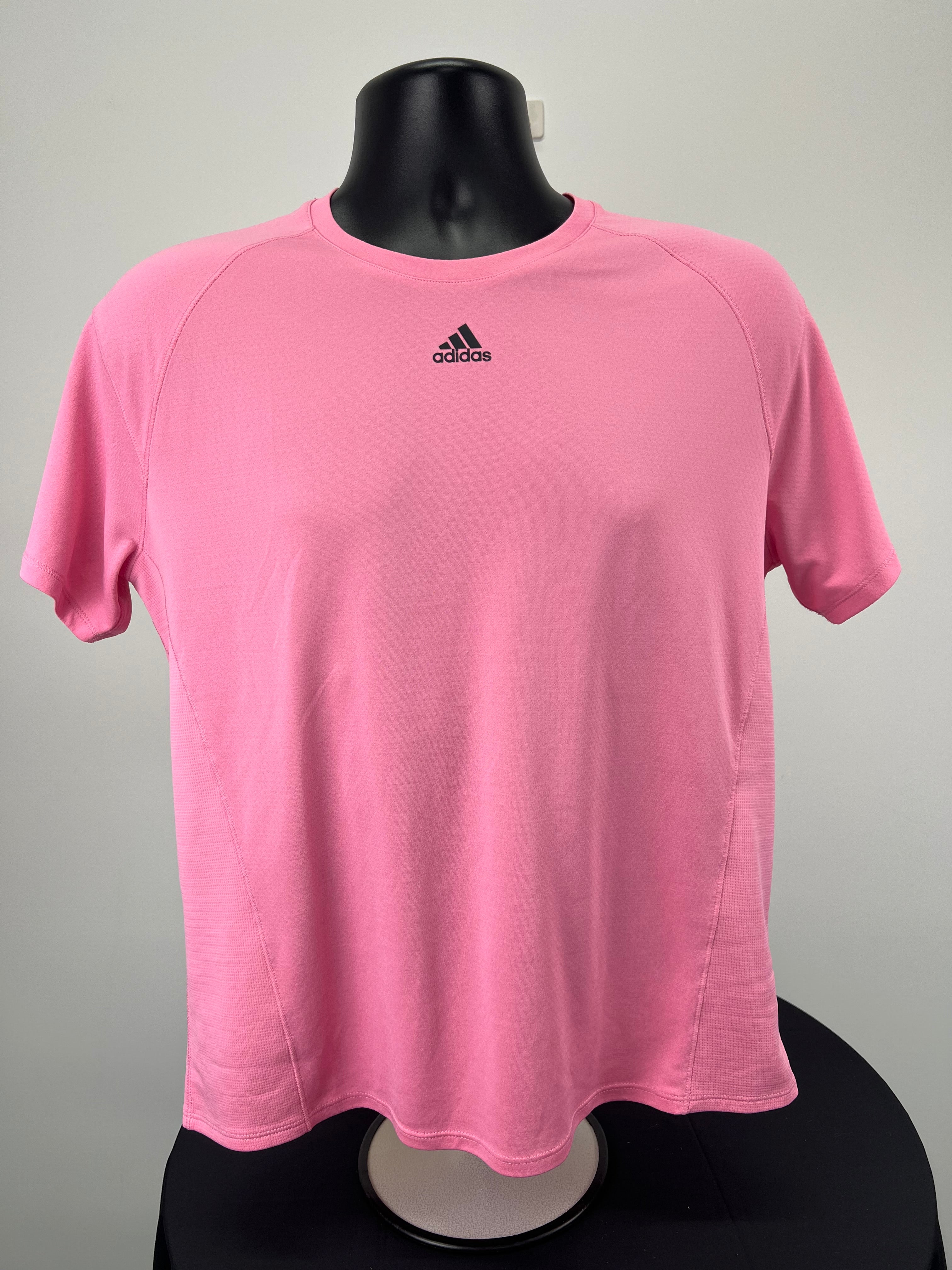 Front view of Adidas pink training t-shirt on mannequin
