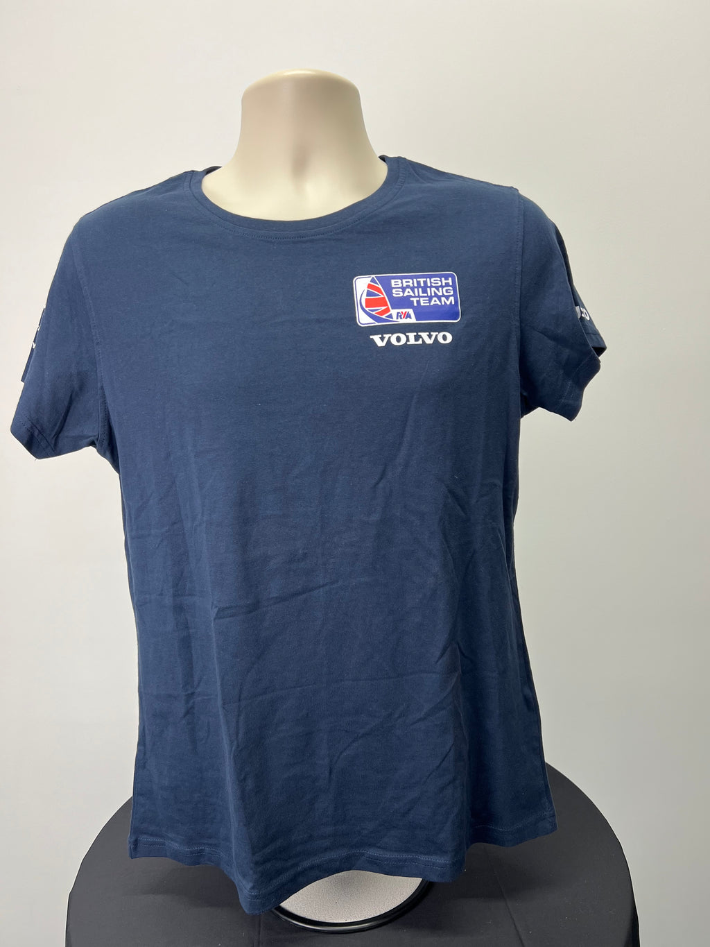 Front view of navy blue British Sailing Team T-shirt with team and Volvo logos