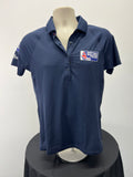Front view of navy blue British Sailing Team women's polo shirt by Musto with button placket and logo on chest