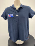 Front view of navy blue Musto British Youth Sailing polo shirt with collar and three buttons