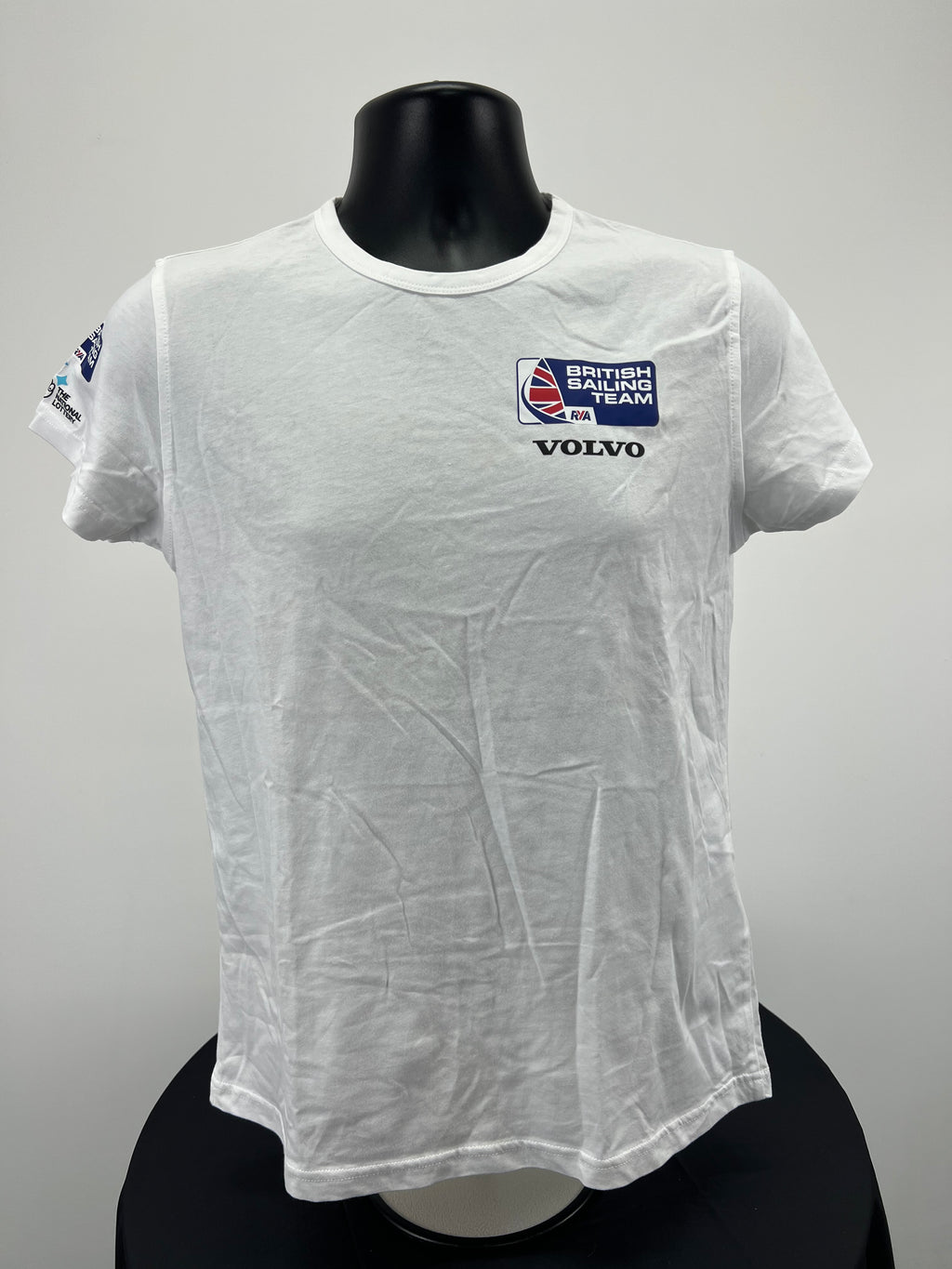 Front view of white ladies' British Sailing Team t-shirt by Musto with British Sailing Team and Volvo logos on left chest