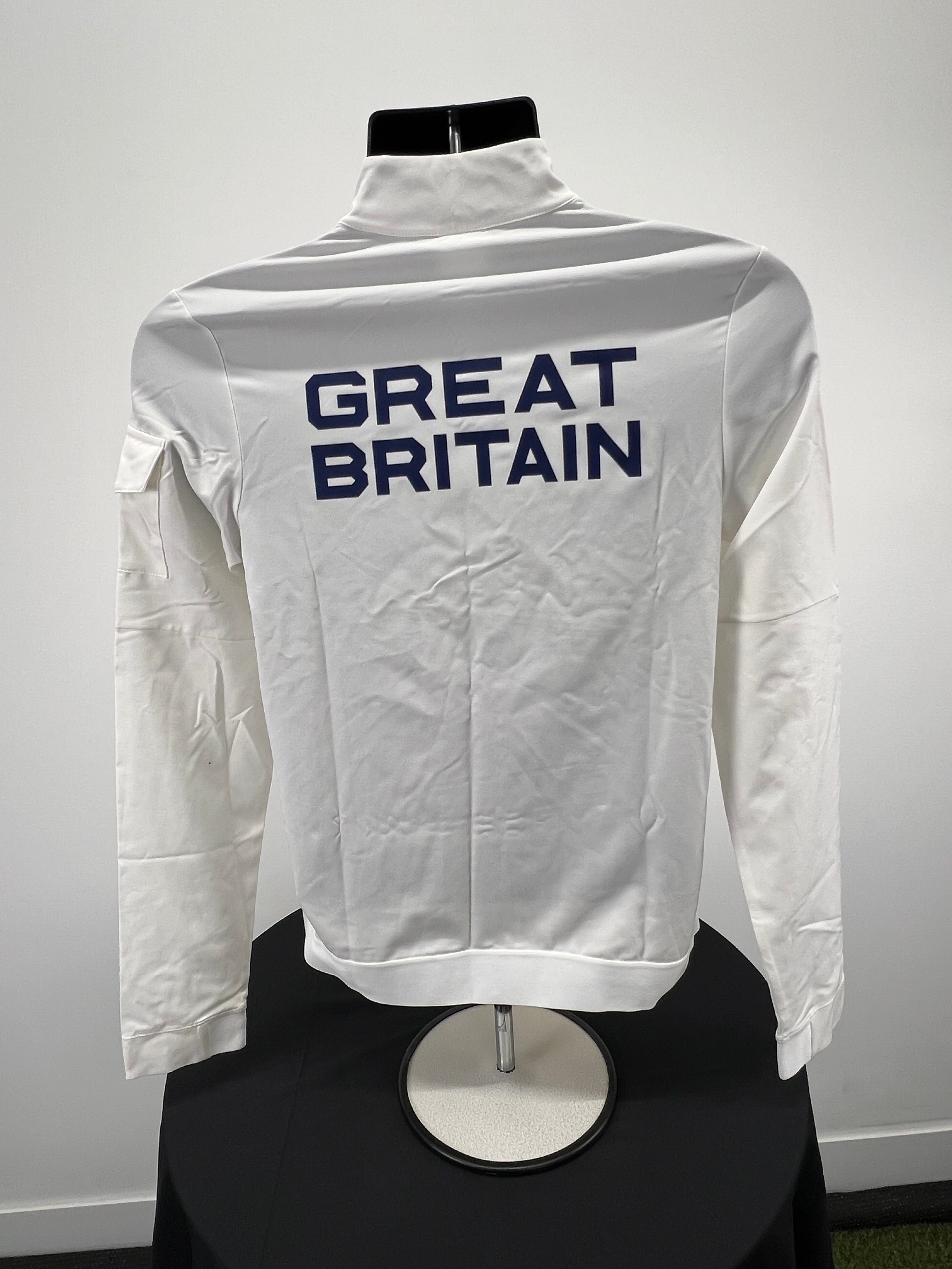 Back view of cream Nike jacket displaying bold text GREAT BRITAIN