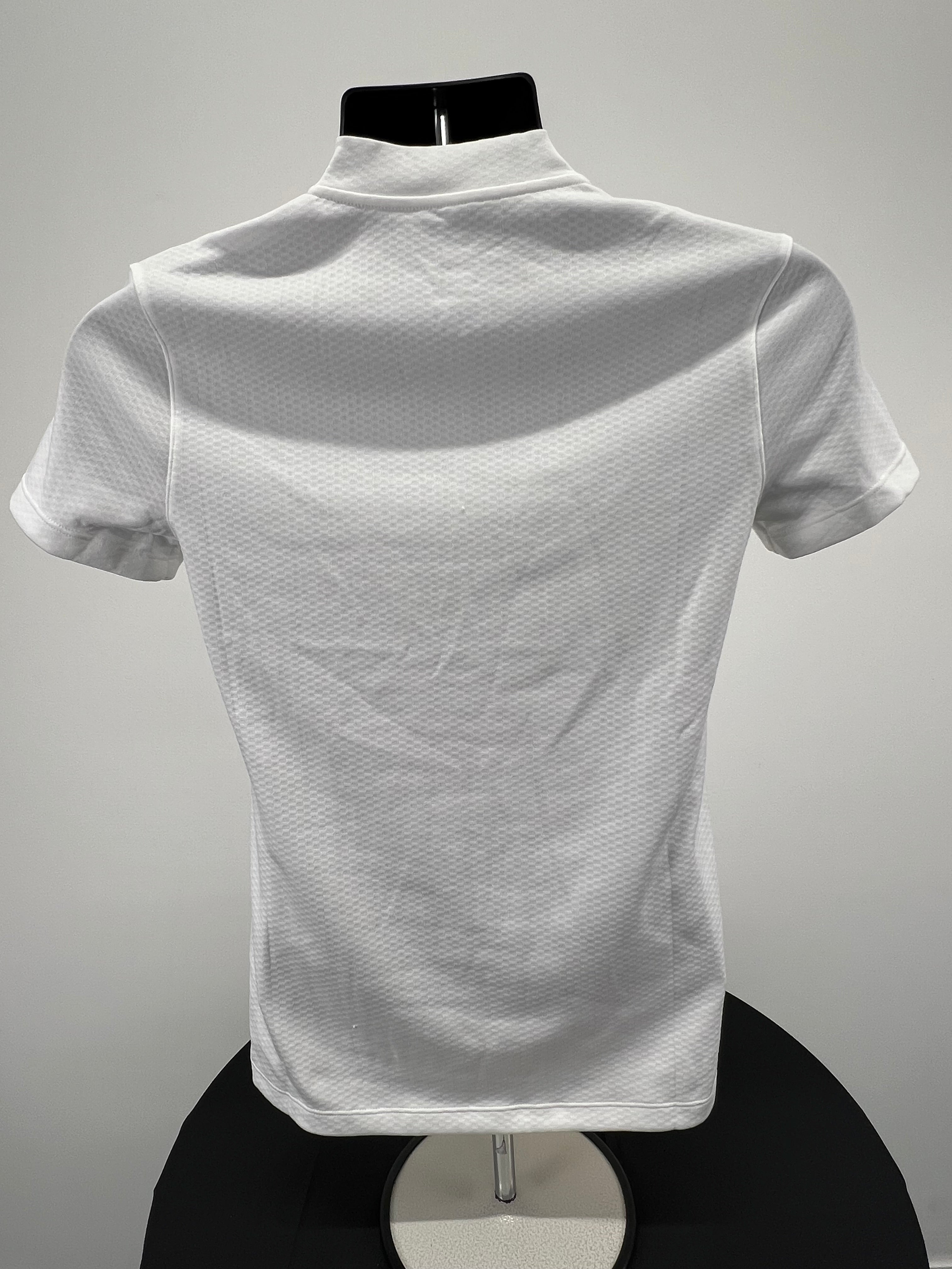 Back view of white Nike women’s half zip top showing textured fabric